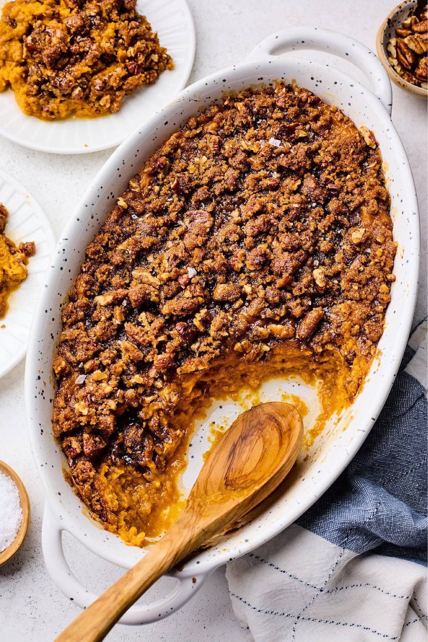 This is the BEST sweet potato casserole recipe! It has a creamy filling that is made with mashed baked sweet potatoes, browned butter, pure maple syrup, and cinnamon. It’s topped with a crunchy brown sugar pecan topping that is divine! It’s the perfect side dish for Thanksgiving and Christmas.

#LTKHome #LTKFindsUnder100 #LTKSeasonal