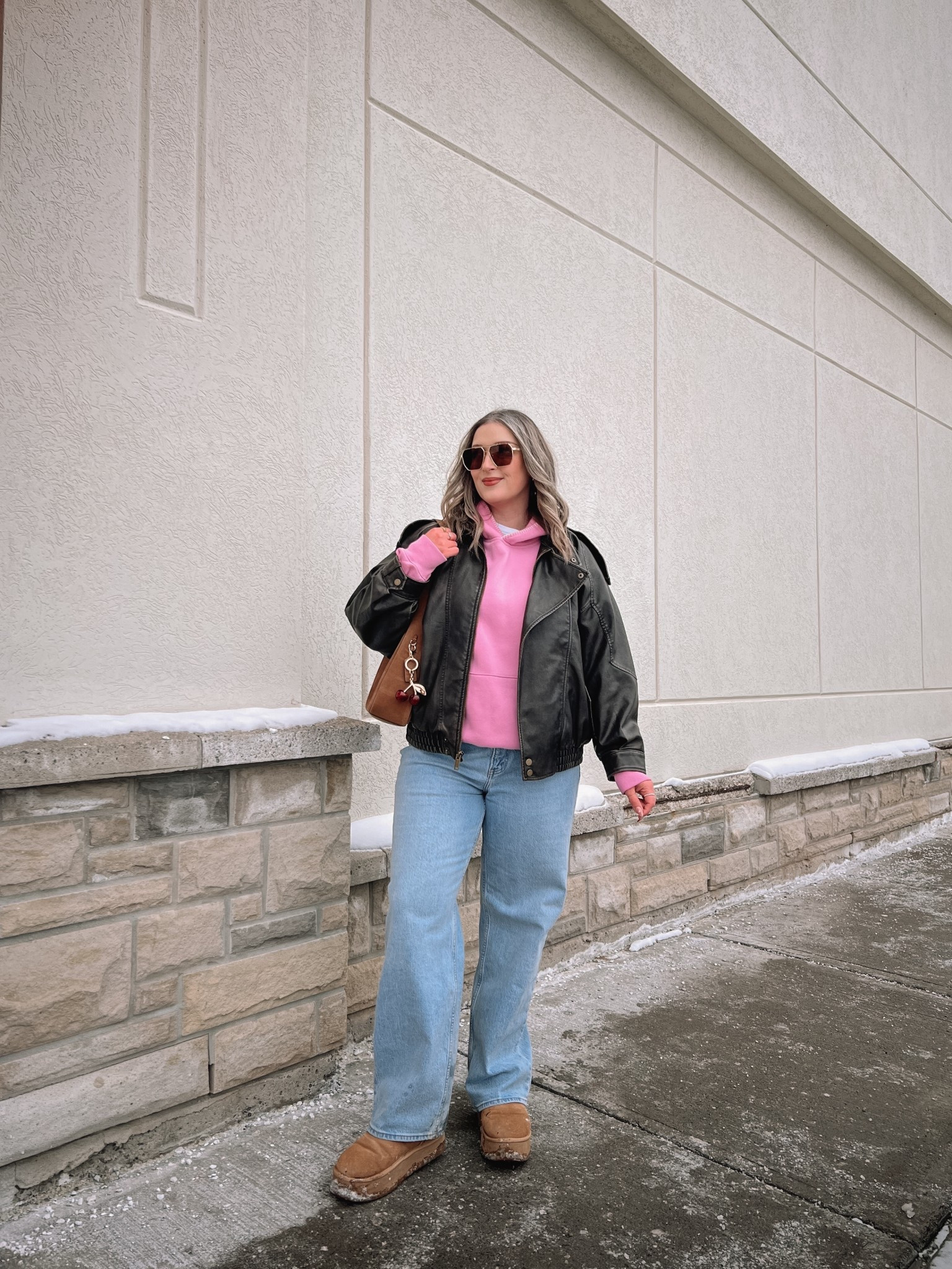 Winter outfit from Abercrombie! Code AFLTK for 25% off! Wearing my usual size L in the leather jacket (color is dark coffee). Pink hoodie runs small so I sized up to XL. Wearing 32 in the jeans for a looser fit. Ugg look for less boots are such good quality, I’m a 9.5-10 and wear a 10

#LTKsale #LTKmidsize #LTKjeans