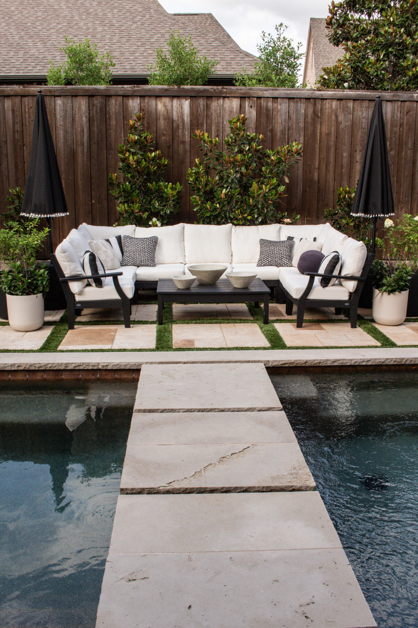 Save this if you're planning a backyard refresh! This gorgeous black and white outdoor design features timeless furniture, layered textures, cozy entertaining spaces, and classic decor you'll love for years to come.

#LTKSeasonal #LTKHome