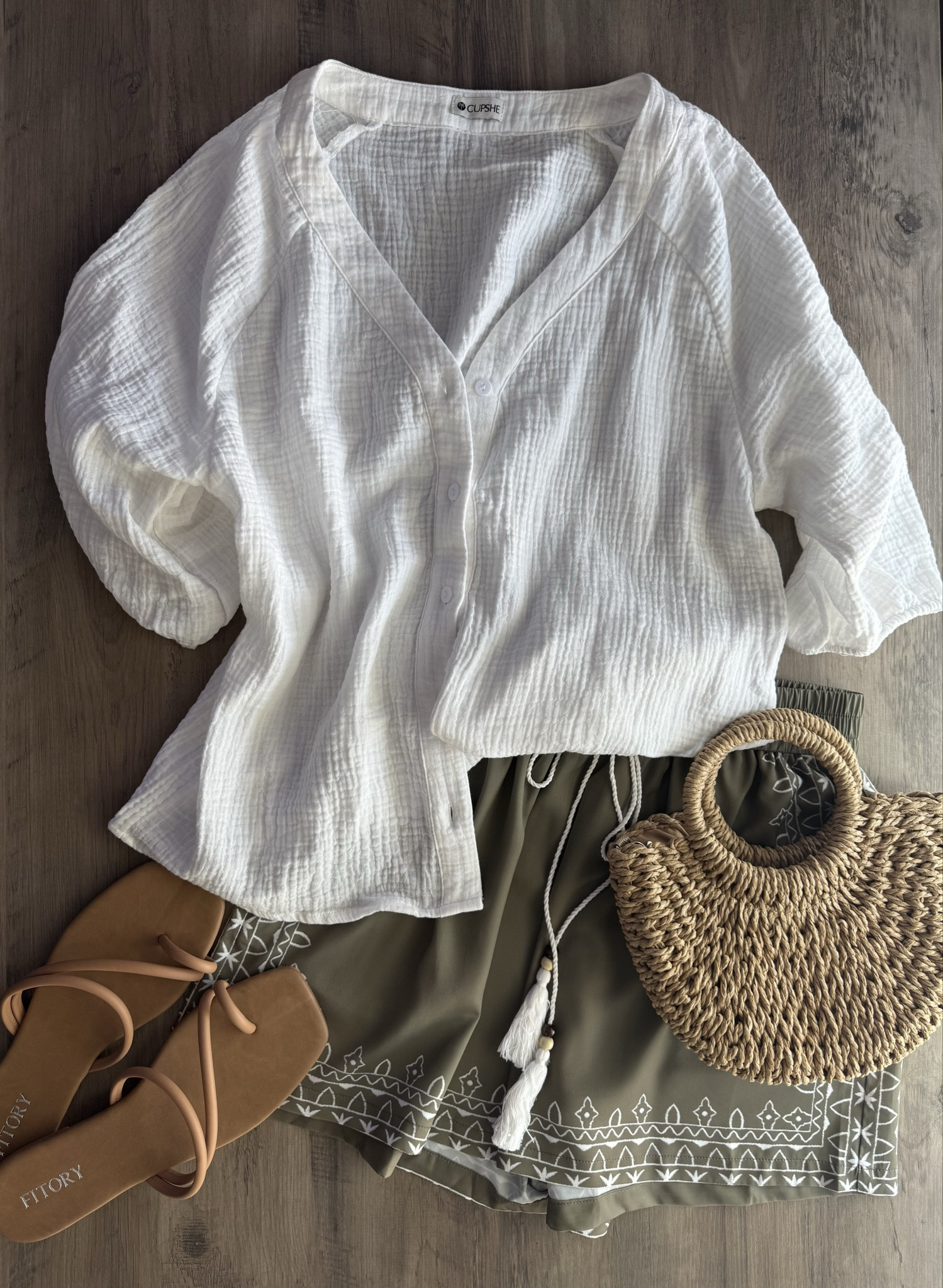 Beach vacation outfit — white cotton button down shirt, lightweight flowy shorts, brown sandals and mini straw handbag 







vacation outfits, tropical outfits, beach outfits, beach clothes, resort wear 2026, summer outfits, beach vacation outfit 

#LTKTravel #LTKSaleAlert #LTKPetite