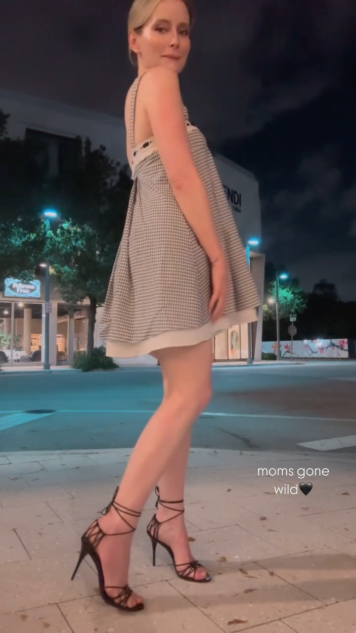 Spring date night fit check💕 loving black and white gingham for spring, east west clutch, YSL Joto strap oy ankle wrap sandals🖤 #babydolldress #strapoysandals #datenight #BottegaVenetta #andiamoclutch 

#LTKShoeCrush #LTKStyleTip #LTKSeasonal