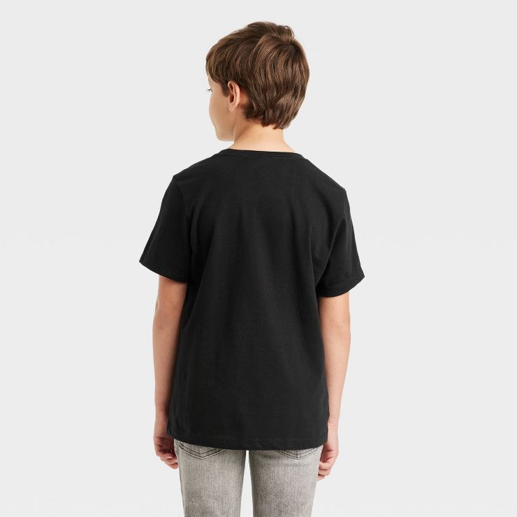 Boys' Jurassic World Dino Trio Short Sleeve Graphic T-Shirt - Black | Target