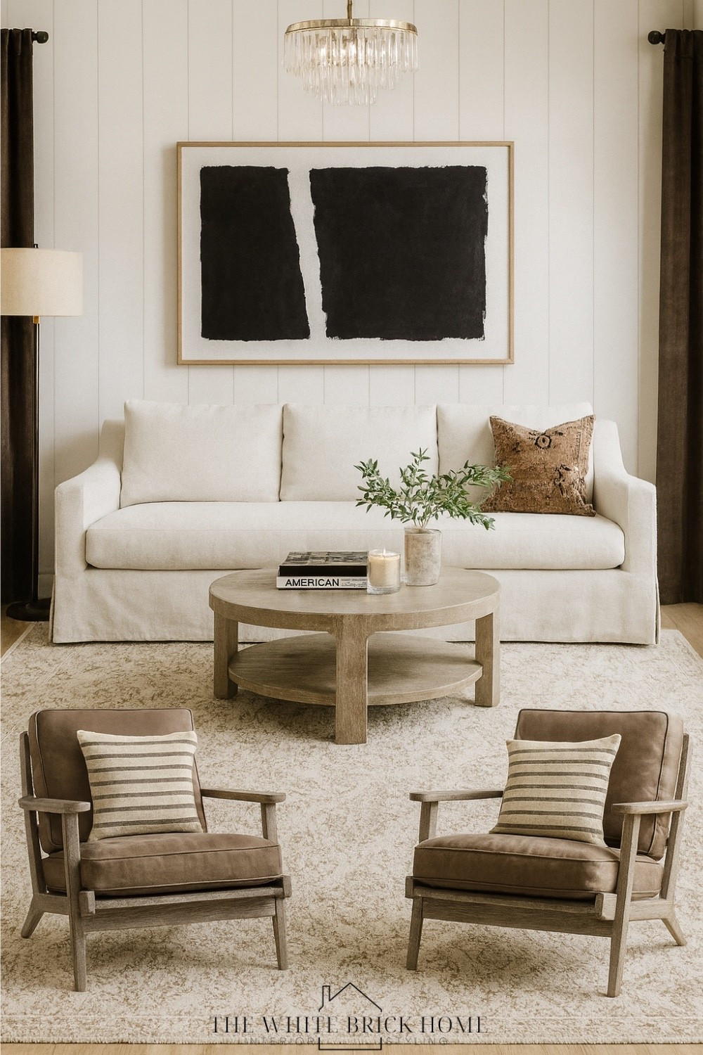 This warm, modern traditional living room blends creamy textures, rich wood tones, and bold art for a space that feels effortless and cozy. 

Living room, living room design, living room decor, home decor, home design, living room seating, accent chair, sofa, couch, wall art, table lamp, coffee table, drapes, throw pillows, leather chair, wall art, wall decor, home decor, home design, living room ideas, vase, decor, area rug, pottery barn living room, crate and barrel, west elm 

#LTKSeasonal #LTKSaleAlert #LTKHome