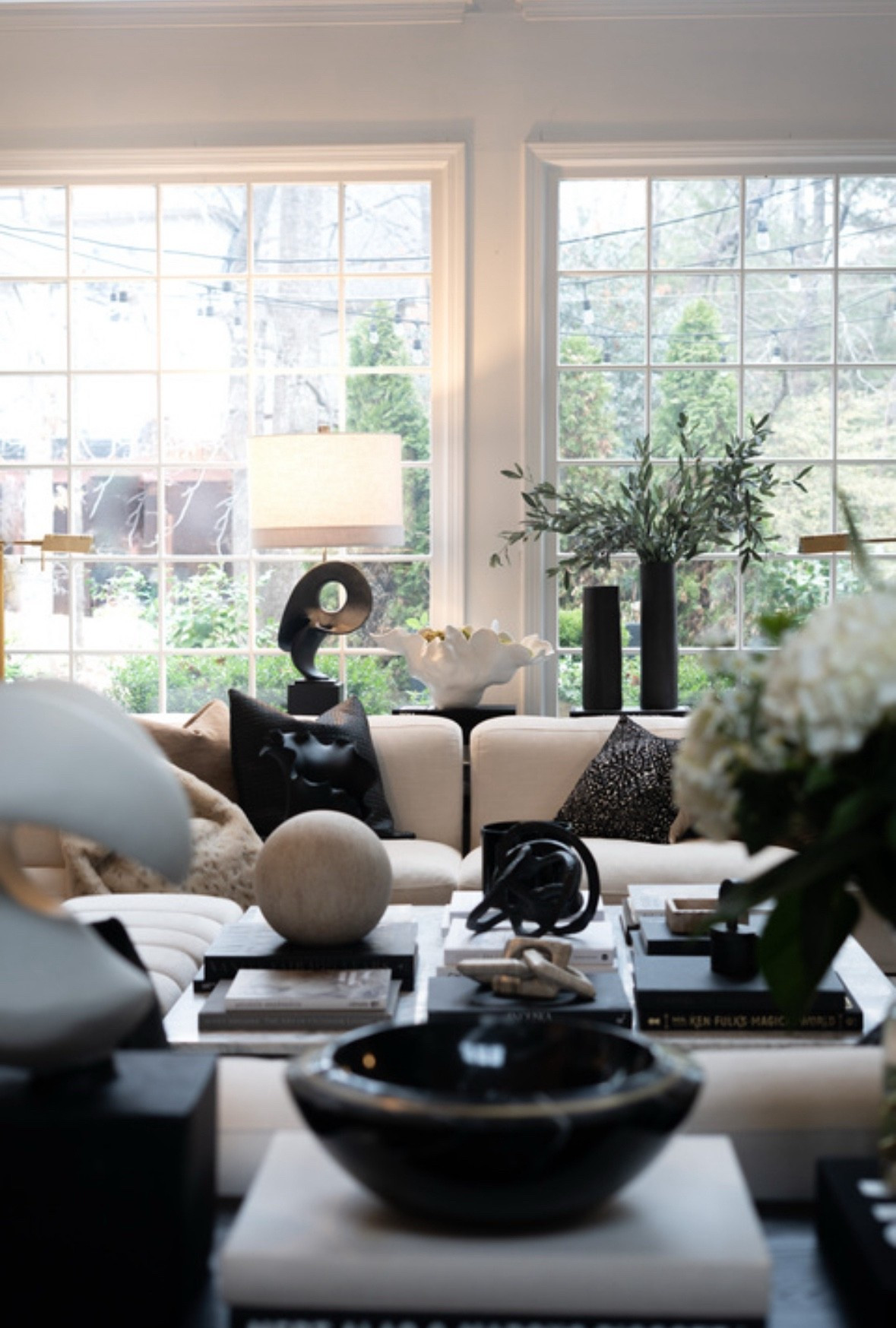 Eeeek! This living room refresh after Christmas breakdown makes me so happy! The layered black and cream palette, sculptural decor, cozy pillows, and organic greenery create the perfect modern luxury vibe. This space feels warm, elevated, and effortlessly chic, with timeless neutrals and bold contrast doing all the work. It’s the kind of interior design that feels calm yet dramatic, curated yet livable, and so perfectly classic modern for everyday luxury living. 

 

#LTKSeasonal #LTKHome #LTKSaleAlert