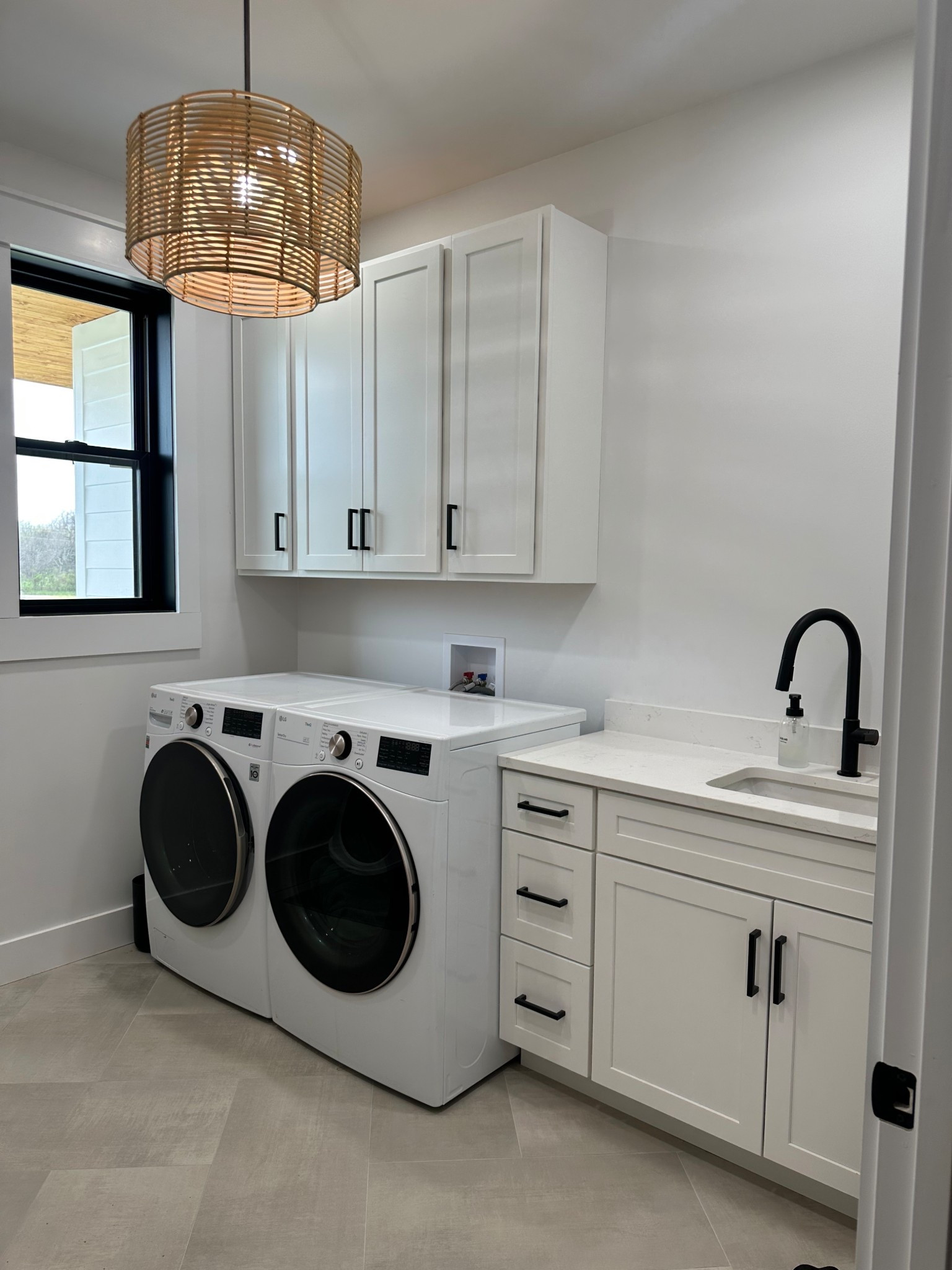 Love our simple, clean, boho laundry room 🤎

#LTKHome #LTKFamily #LTKStyleTip