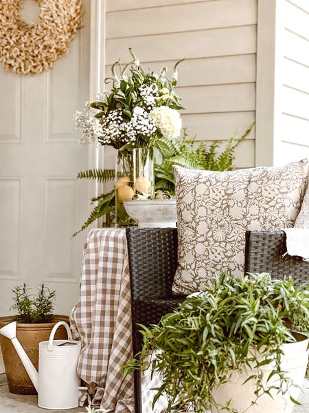 Cozy elements to add to your spring porch: ferns, ivy, urn planters, terracotta pots, floral pillow covers, table cloths, lemons, limes & artichokes. Bring elements from nature into your patio decor to bring an extra dose of cozy. 

#LTKhome #LTKSeasonal #LTKFind