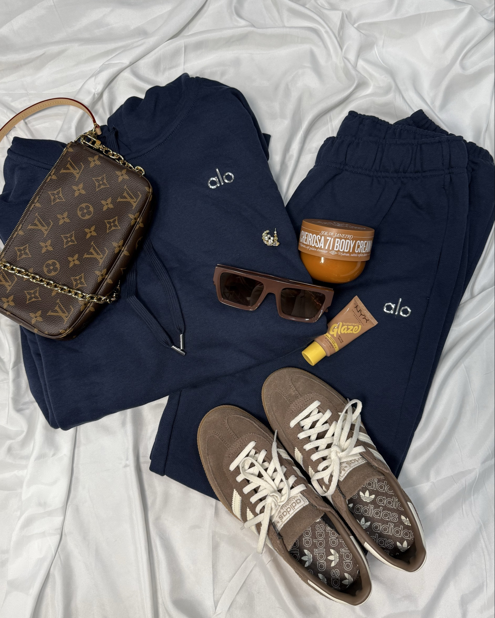 I live in Alo Accolade sets. They last for years! I’ve had Alo pants I wear several times a week for 4 years! 

NYX Glaze is supposed to be a tinted moisturizer, but the color is buildable. It has a lot of pigment, but I like it for “no makeup” makeup days!

Jewelry discount code: JENF

and last but not least, my favorite “wear-everywhere” Adidas Spezials👟

Everything is linked!!👇🏼

#LTKSeasonal #LTKActive #LTKStyleTip