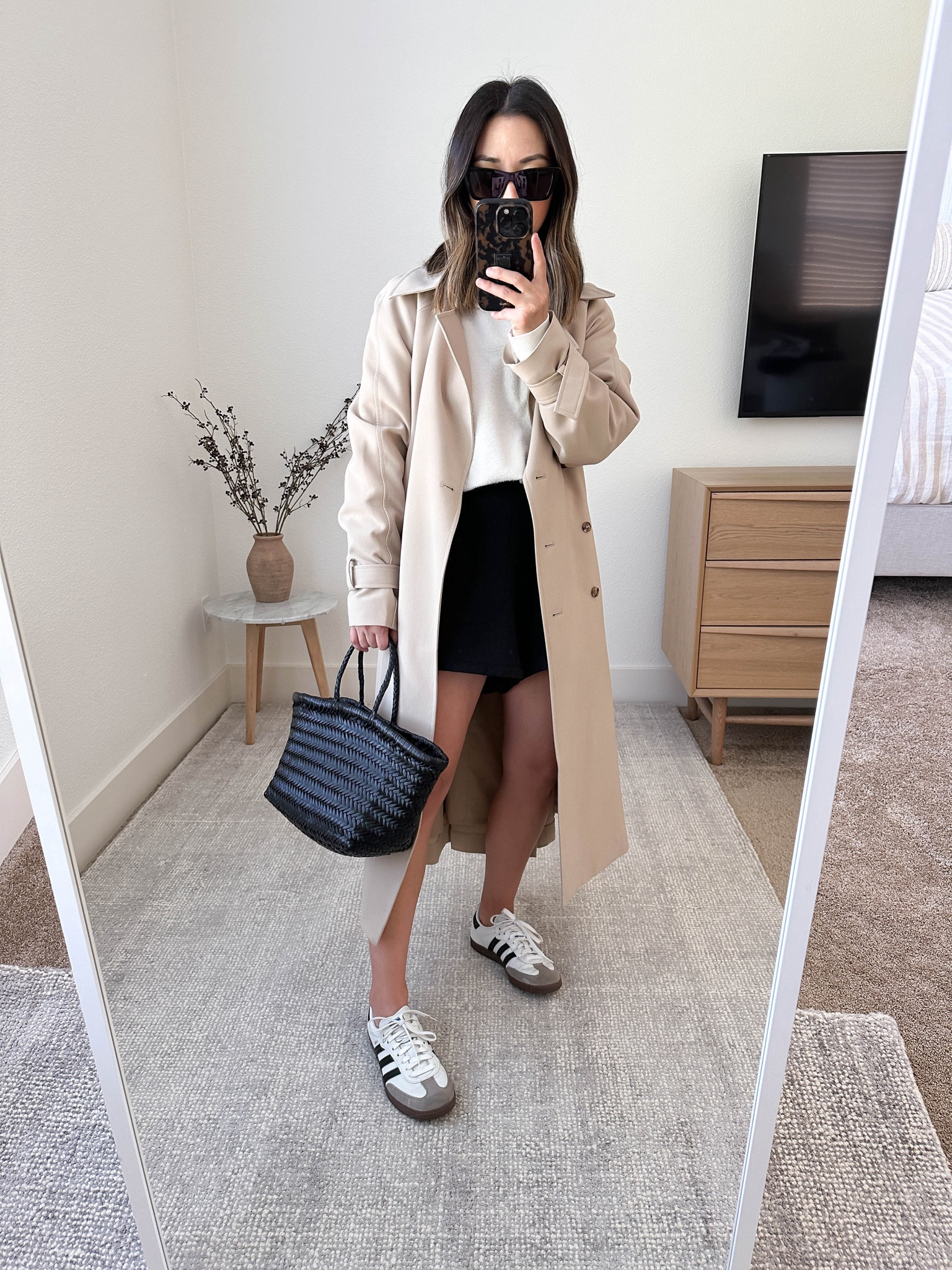 Summer to fall transitional outfits. How to style shorts in the fall. How to style woven bags in the fall. 

Oak & Fort trench xxs. Runs big
Anine Bing sweater xs (old)
Madewell sweats shorts xs (old)
Adidas sambas 4 mens. 
Dragon Diffusion triple jump small
YSL sunglasses

#LTKPetite #LTKStyleTip #LTKSeasonal