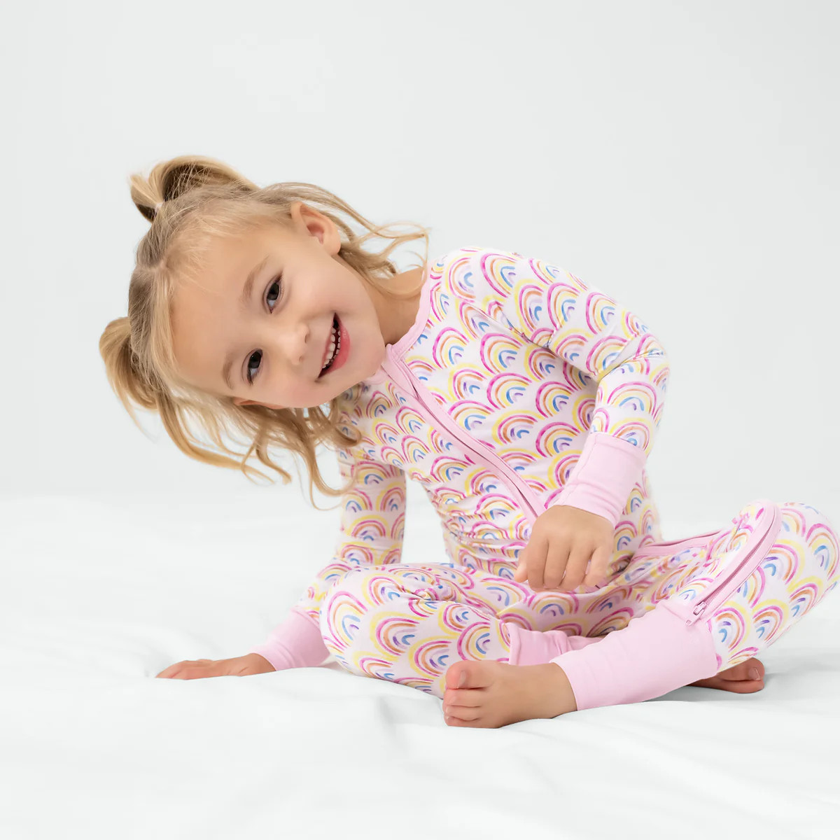Pastel Rainbows Zippy | Little Sleepies