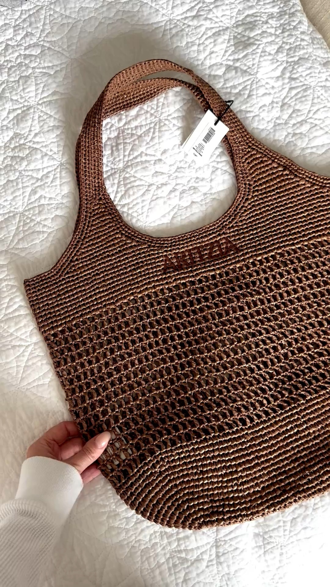Only opinion this Aritzia raffia - look bag is so worth the price. I just had to buy the chocolate brown version - I bought the natural style last year and it still looks brand new after multiple vacations, pool snd beach days 

#LTKSeasonal #LTKootd #LTKSwim