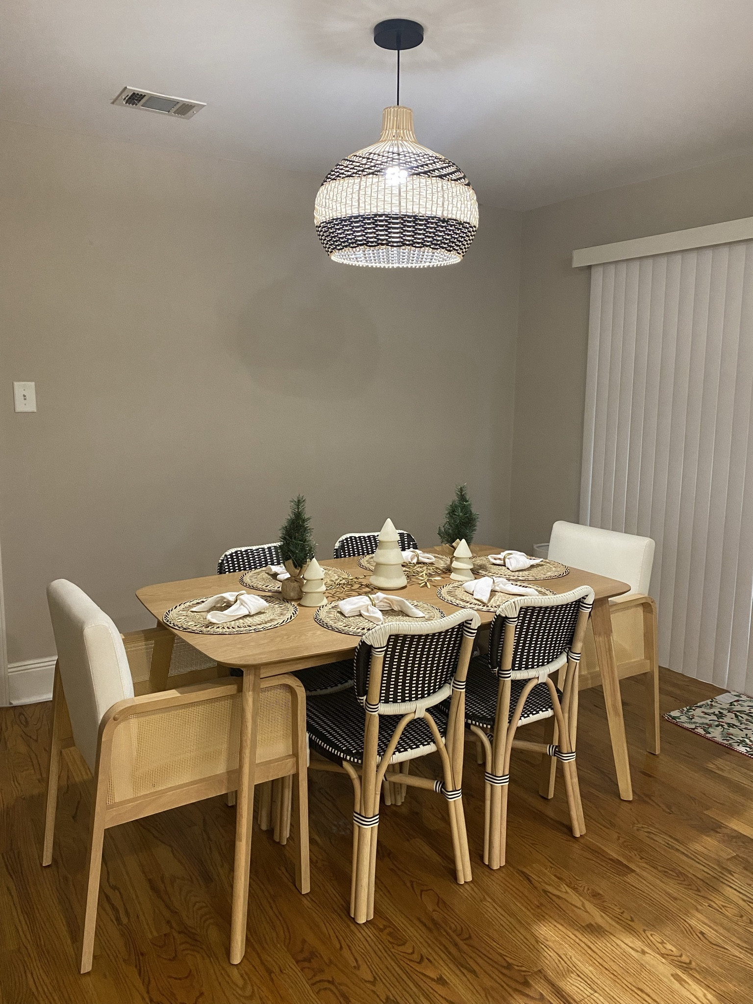 Midcentury Christmas dining 
Christmas decor 
Seagrass
Neutral dining room 
Midcentury dining room 

#LTKHoliday #LTKSeasonal #LTKhome