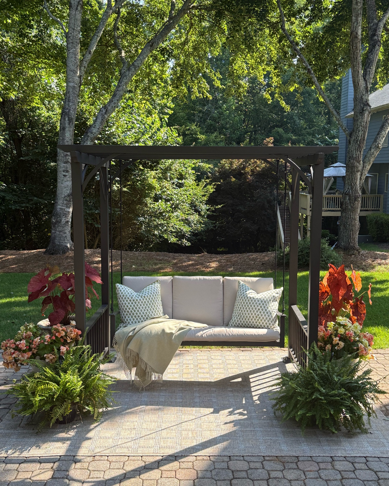 Proof that every backyard deserves a cozy corner.  It’s the kind of outdoor space that makes you want to stay a little longer.

This pergola swing by @purpleleafgarden has completely transformed our patio into the coziest outdoor retreat. Add a few blooming planters, soft pillows, and a throw, and you’ll never want to go back inside.  Use code MICHELLE500 for an added discount on your purchase!  Offer expires 10/2/26.