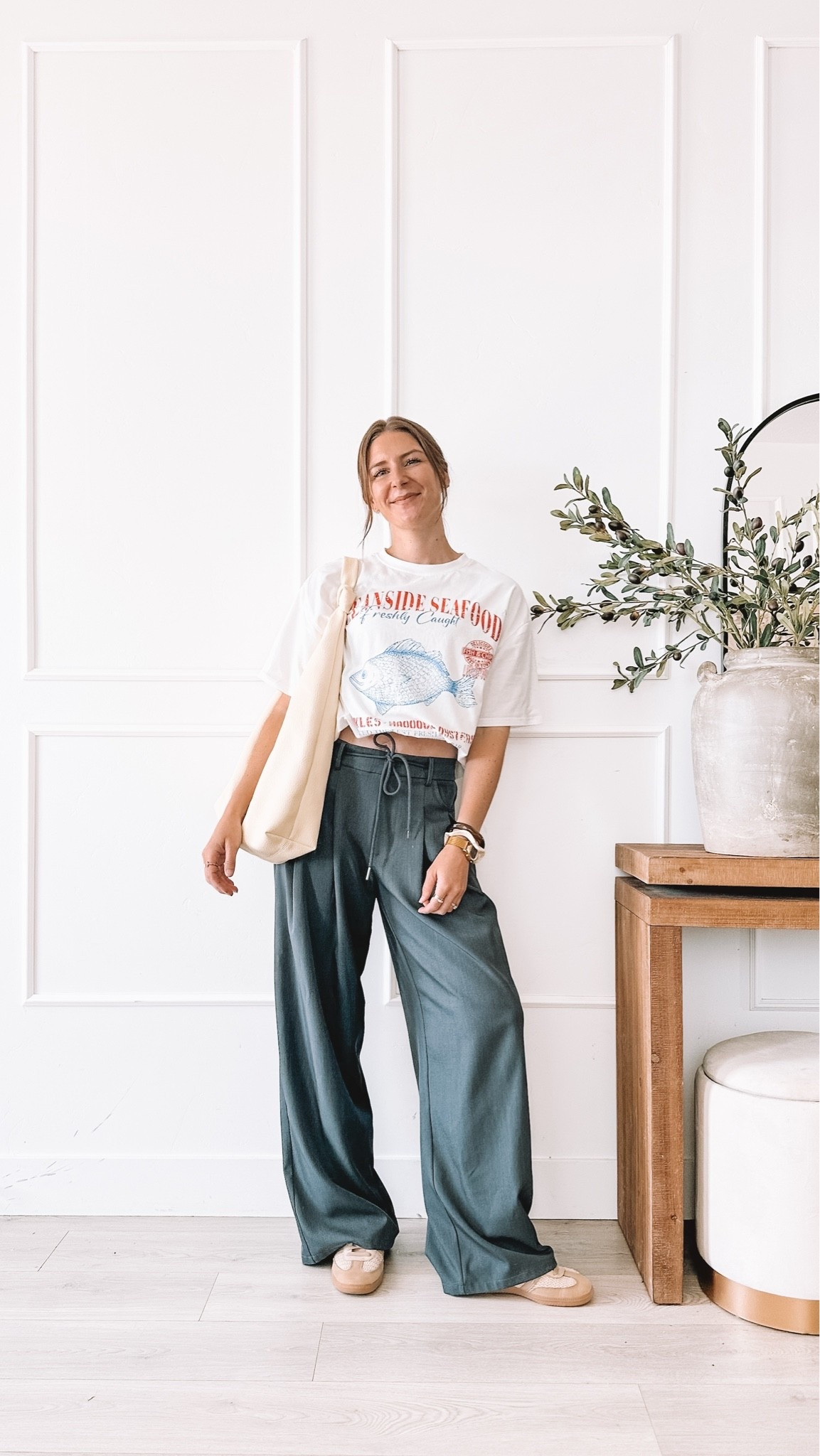 What a homeschooling mom of four actually wears on a daily basis. This graphic tee paired with wide leg pants, sneakers, and a canvas tote is the effortless everyday outfit that proves feeling cute on a daily basis is genuinely life changing. Everything is linked and shoppable below!

#LTKootd #LTKmomlife #LTKgrwm