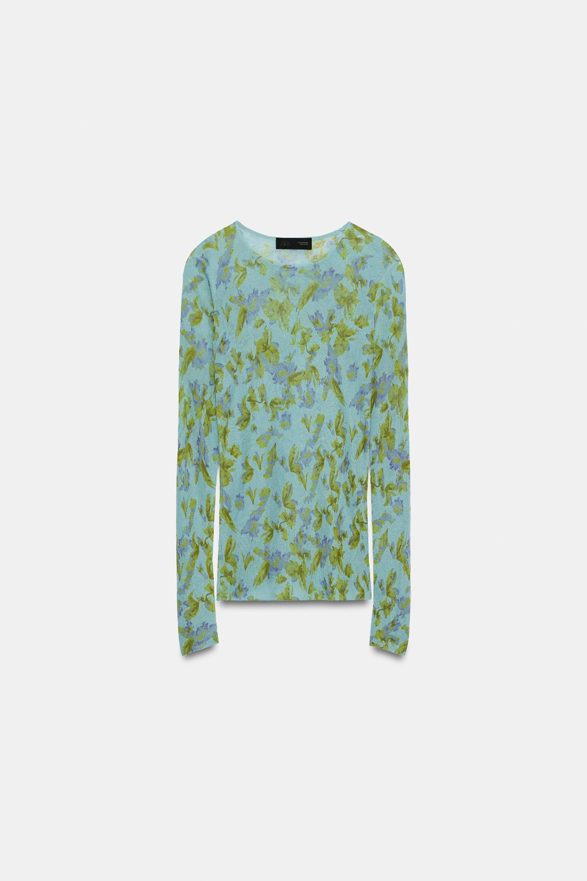 Fine knit top with floral print. Round neck and long sleeves. | Zara US