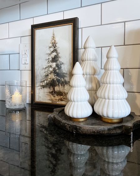 These cute ceramic trees are perfect for a holiday kitchen counter style. Add a vintage print and an LED candle. Love these tea lights that are on a timer. 

#ltkfindsunder50

#LTKHoliday #LTKSeasonal #LTKhome