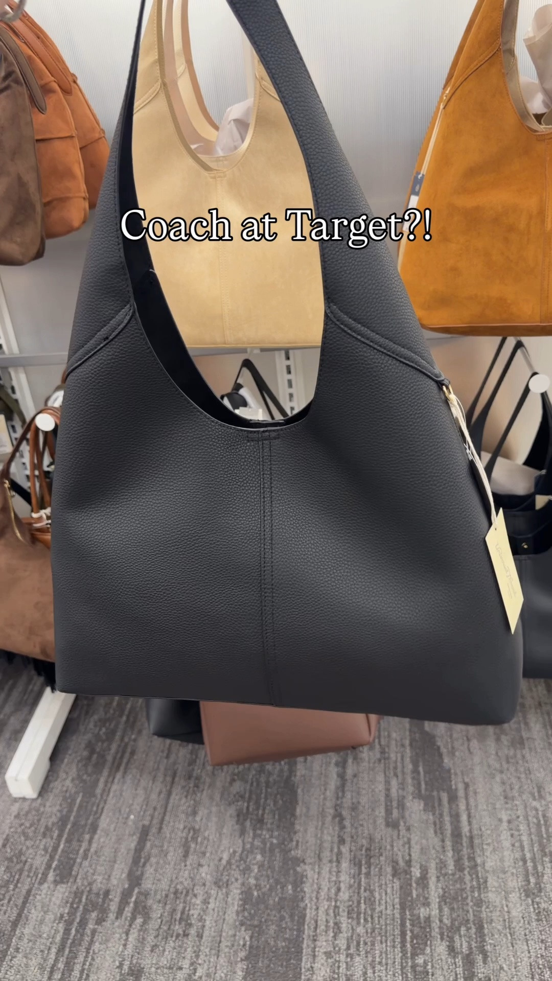 Coach vibes at Target?! Comment SHOP & I’ll dm you the links ♥️

I’m a loyal coach fan but sometimes if I’m not sure if I’ll like a certain bag or shape I’ll buy a more affordable version to see how often I carry it and decide if I want it invest in a more expensive version. And they’re so cute 😍

I love that these totes give Brooklyn vibes and even have the little loops for charms on the side.

There are multiple Kisslock bags and I love a good turn lock 😍