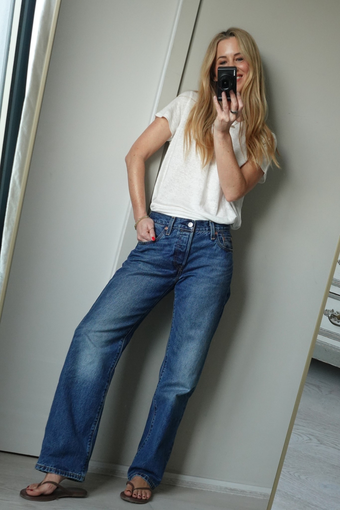 Levi’s 501 90s 
 Work Yourself Selvedge - Blue
I wear 24/30

Uniqlo x Cottoniers Tee I’m in an XS. 
