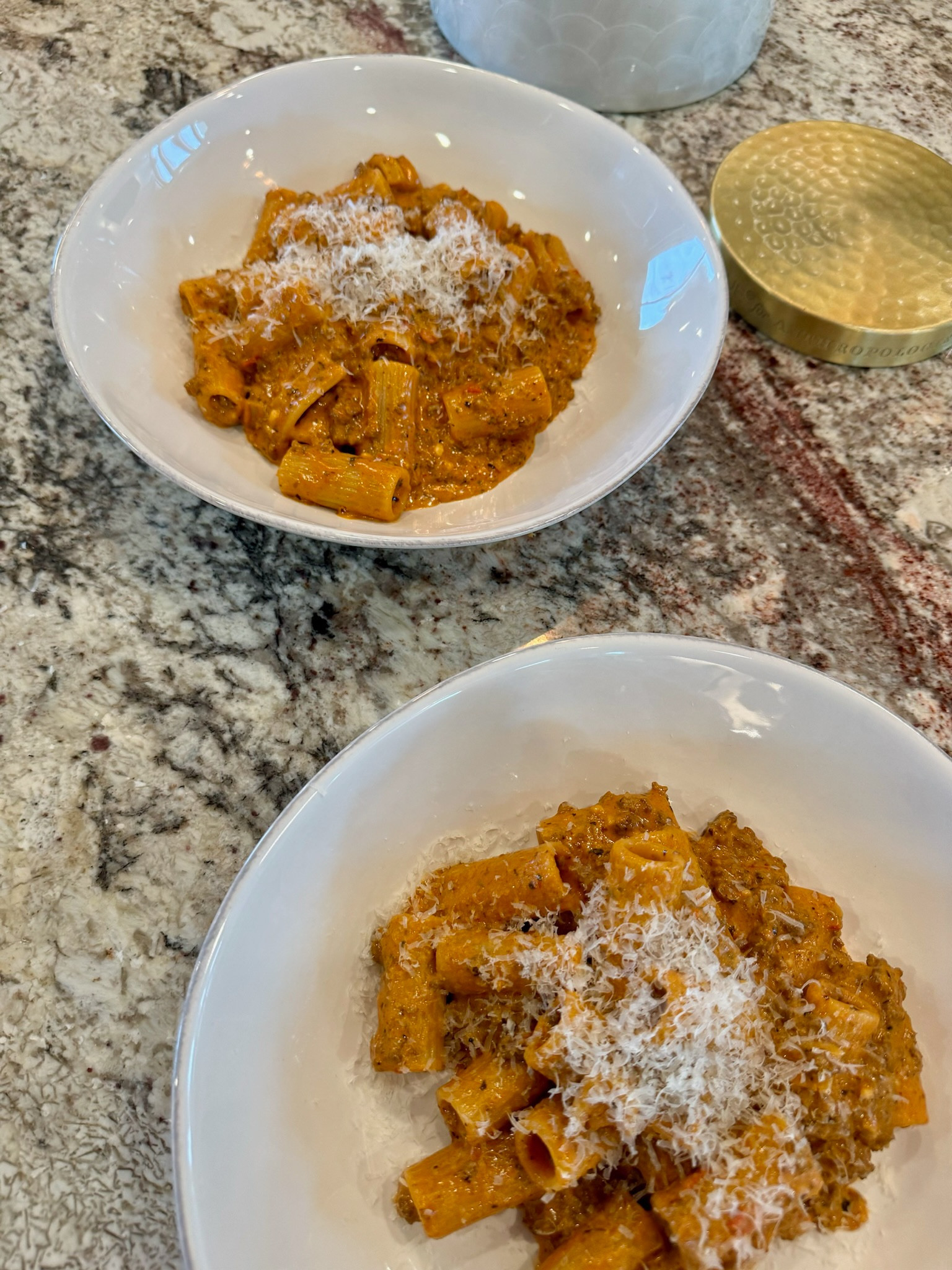 Tried this amazing recipe from @chef_natalie 

I also added ground elk to mine and you could add any protein of your choice! 10/10

ingredients:
- 1/4 cup olive oil
- 3 tsp minced garlic
- 2/3 cup tomato paste
- 2 tbsp hot pepper paste
- 1 1/2 cup heavy cream
- 3 tsp dried basil
- 3 tsp red pepper flakes
- 1 tsp italian seasoning
- 3/4 tsp black pepper
- salt to taste
- 1 cup parmesan
- 1/4 cup pecorino romano
- 1 lb box rigatoni
- 3 tbsp butter

Boil noodles

Heat olive oil on medium heat, add & sauté minced garlic, add in tomato paste, mix in cream, pour in dry spices & cheese, mix until creamy, add in pasta & protein, stir in butter. 

Enjoy


#LTKFamily #LTKFindsUnder50 #LTKHome