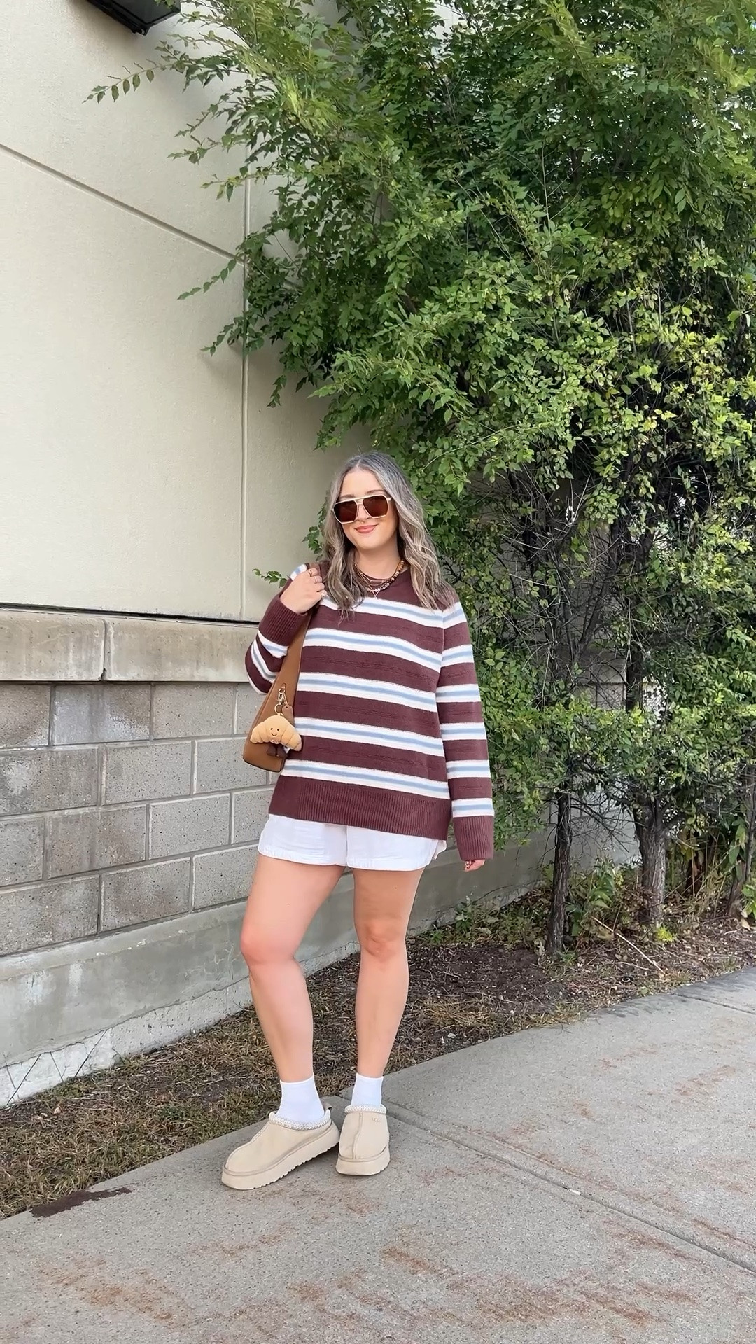 Early fall ootd! Sized up to XL in the sweater for an oversized fit. Shorts are old, linked similar. I’m a 9.5-10 shoe and wear a 10 in the Ugg Tazz platforms

#LTKfall #LTKmidsize #LTKstyletip