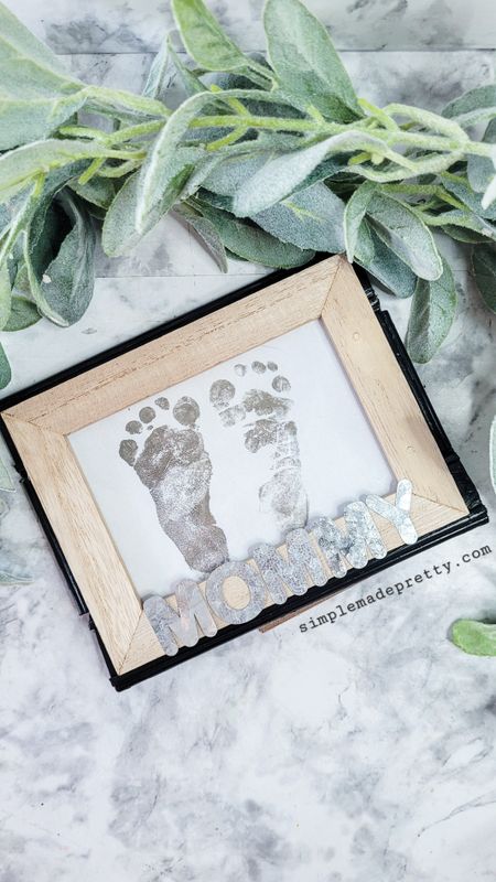 Dollar Tree DIY 1st Mother's Day Framed Baby Footprints 💕 Supplies:-Small Picture Frame-Race Car Tracks Challenge Item-Galvanized Alphabet Letters-Black Spray Paint-Hot Glue Gun-Hot Glue-Printed Baby Foot Prints Find the Full Tutorial at https://simplemadepretty.com/mothers-dollar-tree-diy/ Follow me on the LTK app and my Amazon Store for links to supplies!#mothersday #mothersdaygift #mothersdaygifts #mothersdaygiftideas #giftsformom #giftsformoms #giftsformommy #firstmothersday #firstmothersdaygift #dollartreeobsessed #dollartreereels

