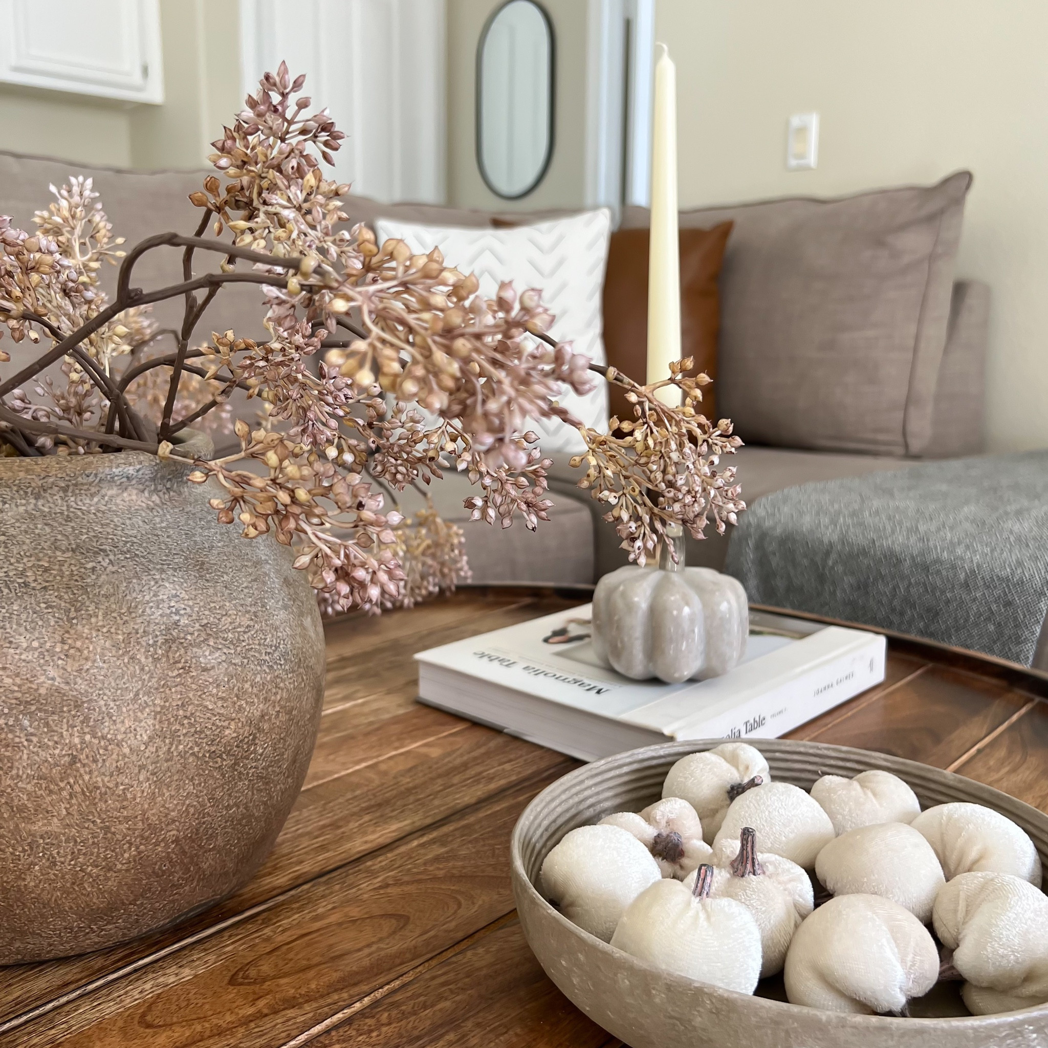 Fall views in our loft! 

Fall decor, round table, mango wood, pumpkin fillers, round vase, textured vase, brown vase, oval mirror, black mirror, decorative books, amber glass candleholder, glass candleholder


#LTKSeasonal #LTKhome #LTKstyletip
