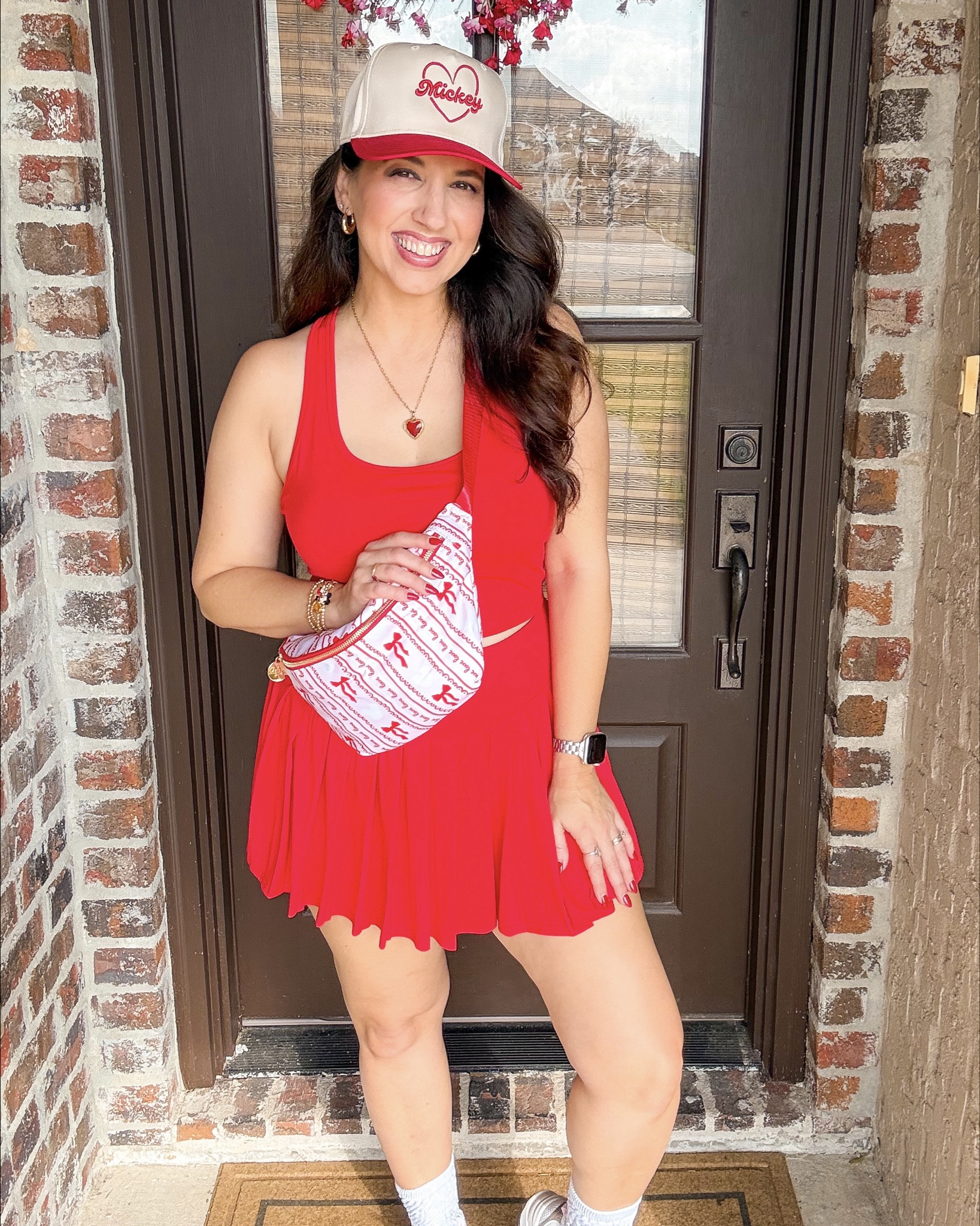 Love is in the air… and so is my love for Mickey 💘🐭
• Red athletic fit from @pinspark ❤️🏃‍♀️
• Heart Mickey trucker hat from @mainstreetcollective
  → use code DEANN15 to save 💖
• Sneakers from @newbalance 👟
• Bracelets from @baublebar ✨
• Bag from @sewmagicco 👜
• Necklace from @kendrascott 💕
All Linked in my LTK 

#LTKmomlife #LTKootd #LTKdayinmylife
