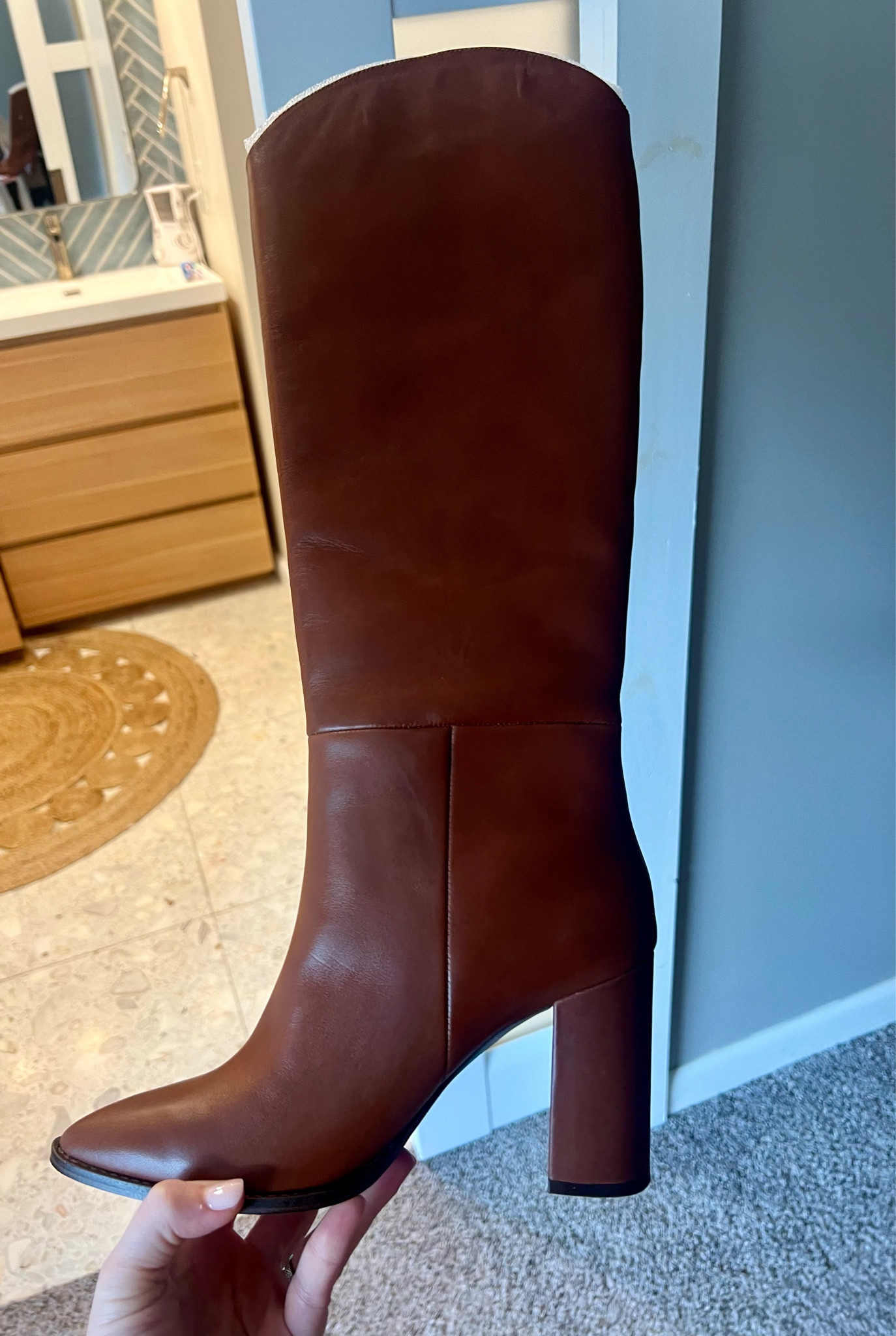 These Steve Madden tall brown boots are perfect to wear with a midi skirt. The block heel makes them easy to wear and the color is beautiful, sure to match so many things in your wardrobe. Perfect for work outfits too  

#LTKworkwear #LTKSeasonal #LTKfindsunder100