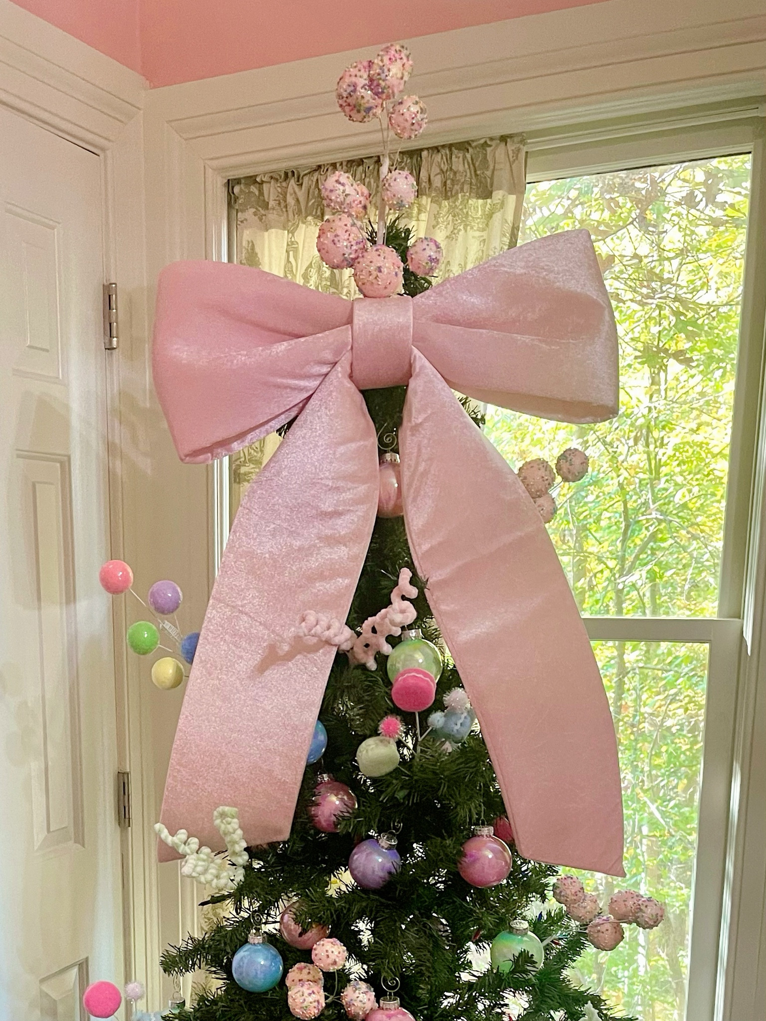 Pink Christmas decor, candy themed Christmas tree, tree topper, Christmas tree bow, nursery Christmas decor 

#LTKHoliday #LTKFindsUnder50 #LTKHome