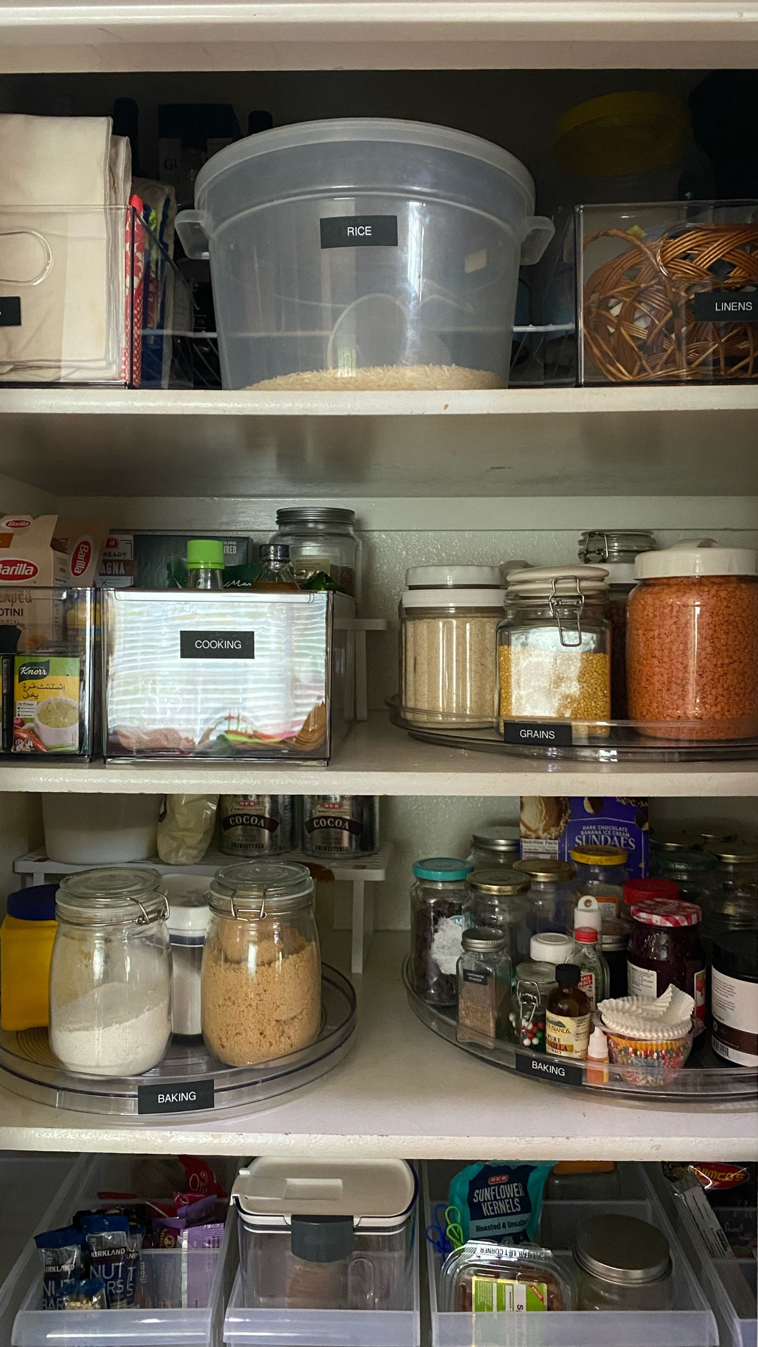 Deep pantry shelving can be beautiful, but it requires the right storage to stay functional. With shelves over 20 inches deep, every product in this space was chosen intentionally to prevent items from getting lost in the back. 

Long divided bins create drawer-style storage for easy access, while 20 inch turntables maximize visibility and make full use of the depth without sacrificing organization. 

#LTKHome