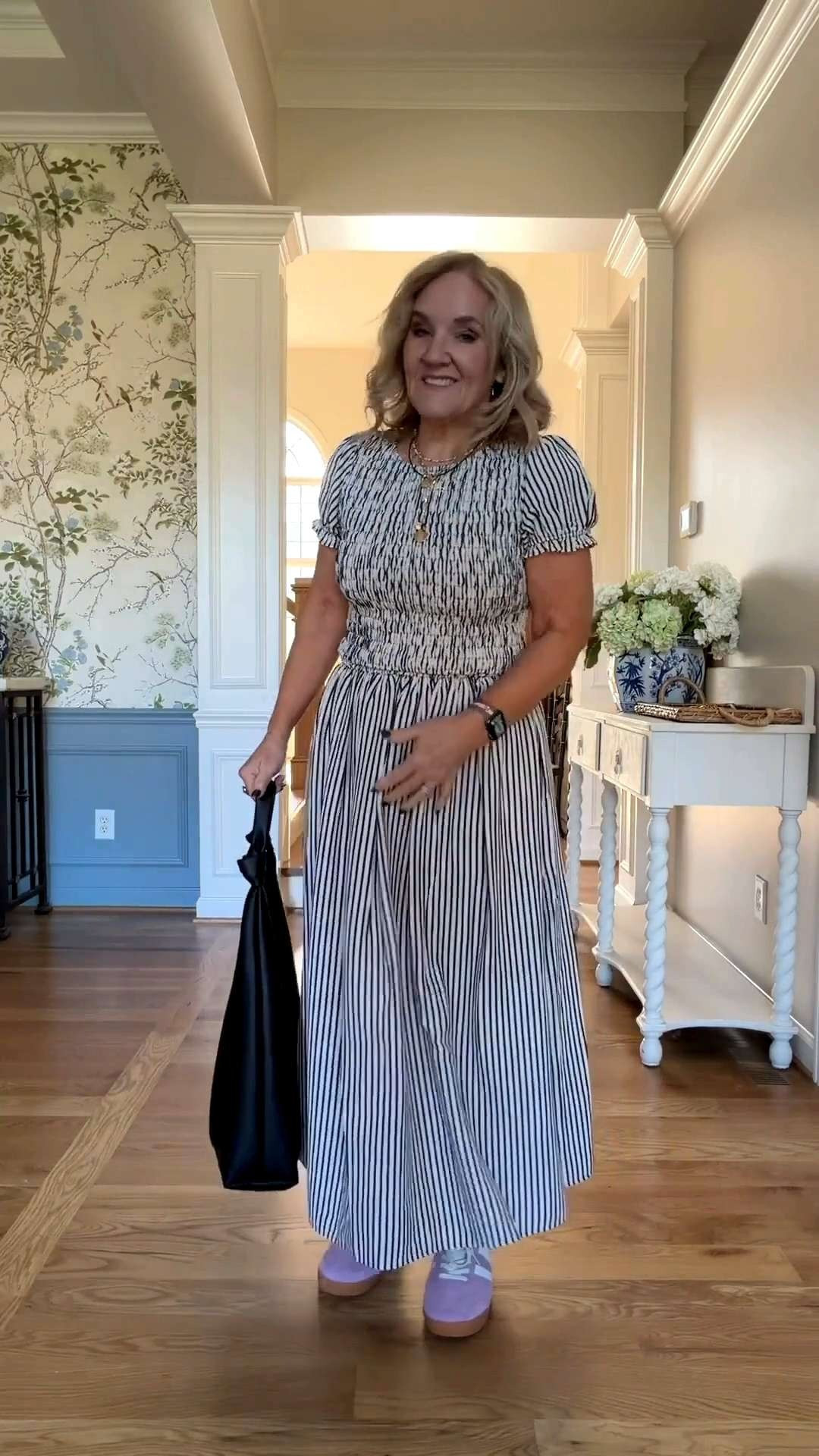 🫶 Anthropologie is currently 20% off with my promo code NANETTE20! 🤍

Is there anything more timeless than a striped midi dress? This one is an absolute keeper! As a petite, finding a dress that offers this kind of lovely, structured silhouette without being overwhelming can be tough, but this smocked bodice and defined waist are so flattering. The lightweight cotton is a dream for warmer weather. I’ve styled it here with my favorite purple sneakers for a bit of playfulness and a classic black tote. This is the perfect, easy-breezy outfit for everything from a garden party to a museum trip.

✨ Remember to use NANETTE20 for 20% off at Anthropologie! 🤍🌸

#LTKootd #LTKOver40 #LTKSaleAlert