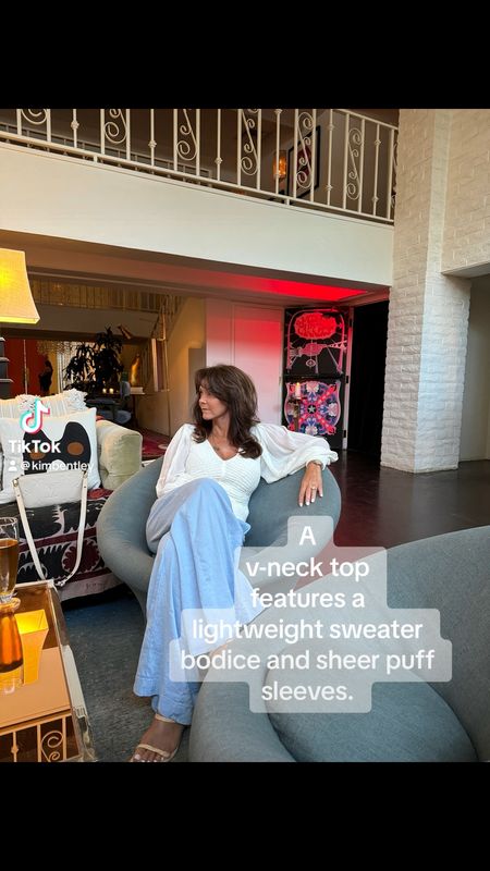 A new favorite top! The prettiest lightweight summer sweater with sheer puff sleeves. The sheerness elevates this pretty v-neck top! I styled it with wide leg trousers and raffia strappy heels. 
kimbentley, summer outfit, vacation outfit, date night outfit, petite style,

#LTKOver40 #LTKVideo #LTKParties