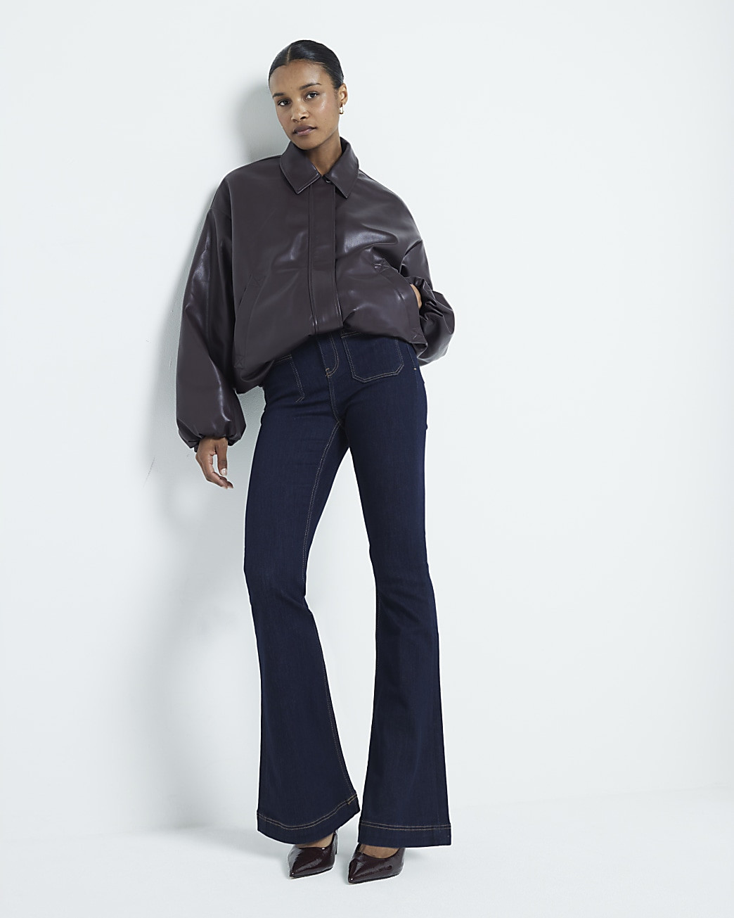 Blue front pocket flared jeans | River Island (UK & IE)