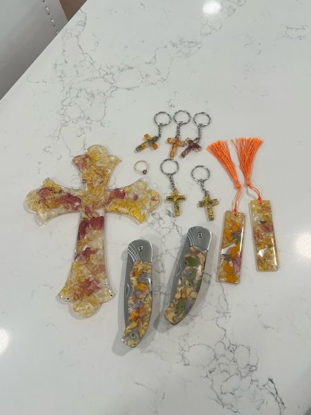 Funeral flower memorials, I dried the flowers and had them turned into resin keepsakes for our family! Key chains, crosses, pocket knives, and bookmarks for gift ideas. 

#LTKHome #LTKGiftGuide #LTKFamily