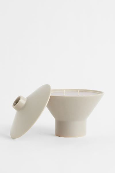 Large, scented candle in a ceramic holder with matching lid to help preserve fragrance when candl... | H&M (US + CA)