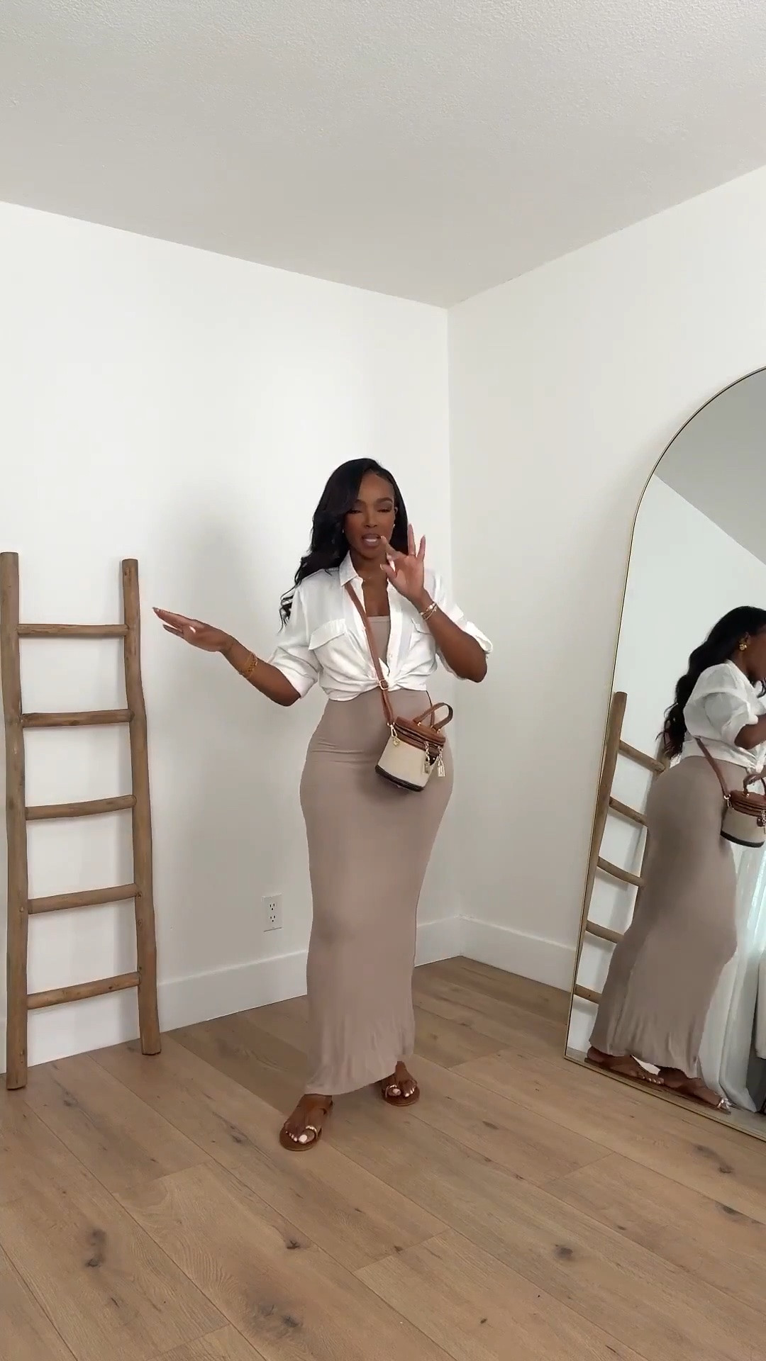 Hi Babes! 🤎✨

An elevated neutral look that feels effortless but looks so put together. The fitted maxi skirt paired with a crisp white button-down creates that chic, vacation-meets-luxury vibe we all love.

✨ Fit Details:
• White button-down shirt
• Fitted stretch maxi skirt
• Neutral crossbody bag
• Flat sandals
• Lightweight, flattering silhouette

🤎 Where To Wear:
• Vacation dinners
• Resort stays
• Brunch with the girls
• Summer date nights
• Coastal getaways
• Weekend outings

✨ Style Tip:
Tie the button-down at the waist to define your shape and create that effortless elevated look without sacrificing comfort.

Everything is linked below!

xx Kira | IG: KirasFashionFinds

📏 Measurements: 5'4" | 140 lbs | 34D Bust | 27" Waist | 40" Hips