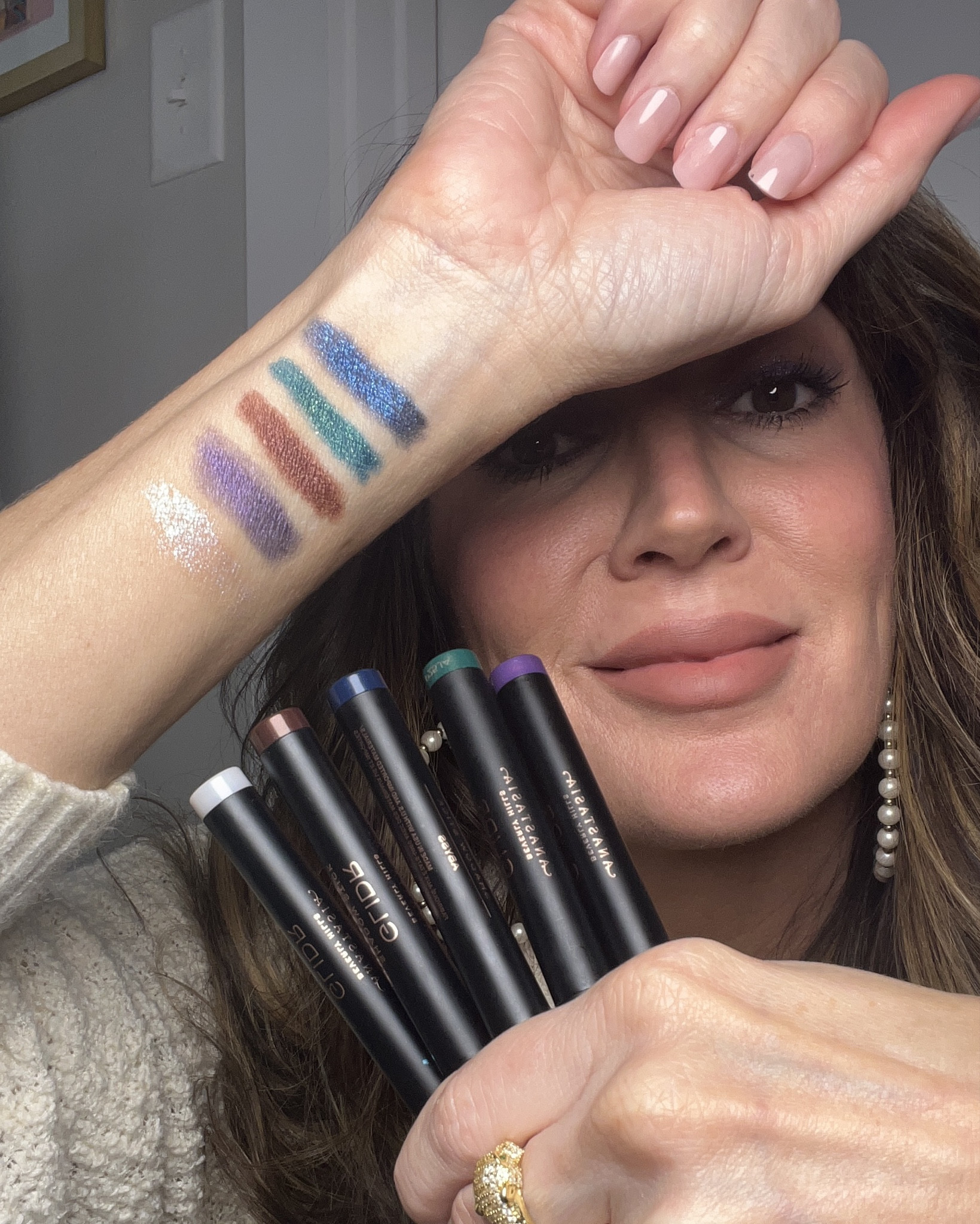 NEW eyeshadow sticks from ABH and they’re GORGEOUS!! Swipe 👉🏼thru these pics to see some on the move. I’m wearing shades here : wisteria, gleam wood, and blue ice! // also wearing ABH lipstick in shade : mauve cloud 

#LTKBeauty #LTKOver40 #LTKgrwm