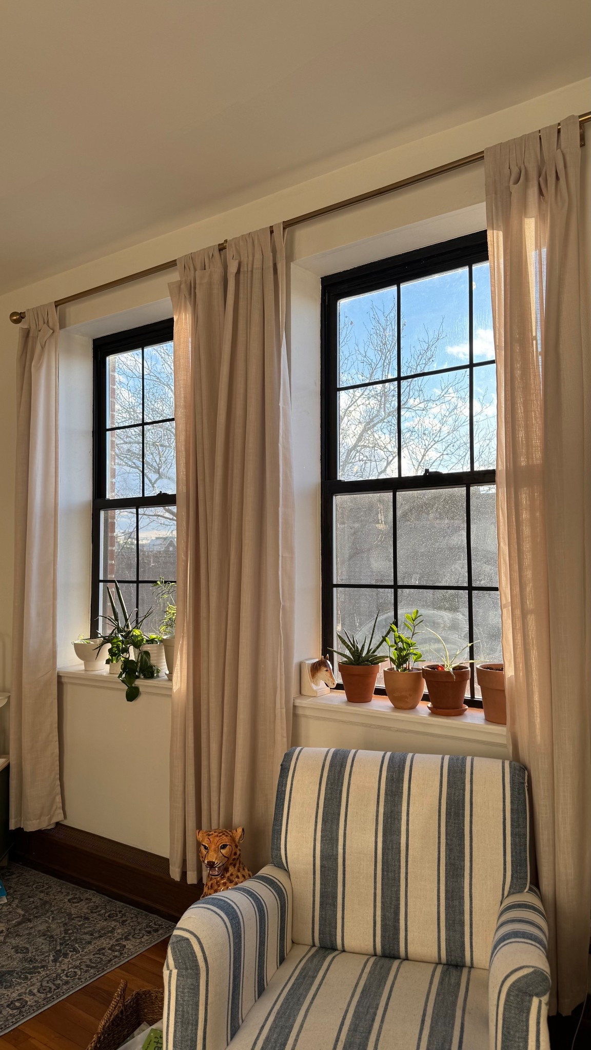 welcome to pt 1 of my “let’s makeover my windows” series! they’re the focal point of my living room so they needed a zhuzh. next up is the air conditioner cover, new curtains, and painting the base of the window frame? thoughts?!