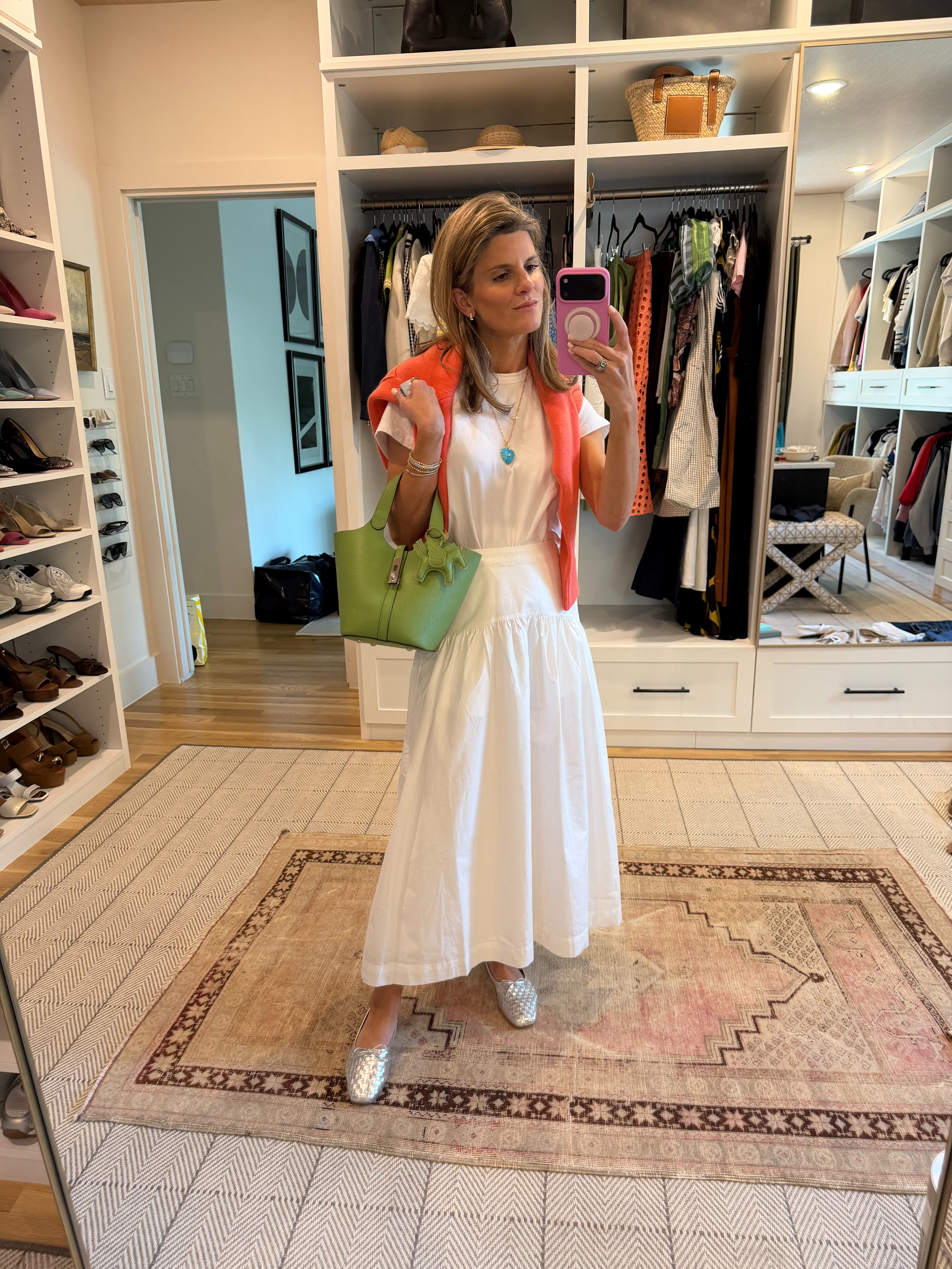 Target white skirt (XS), le set white tee (XS), alice walk sweater (XS), amazon green tote  

 