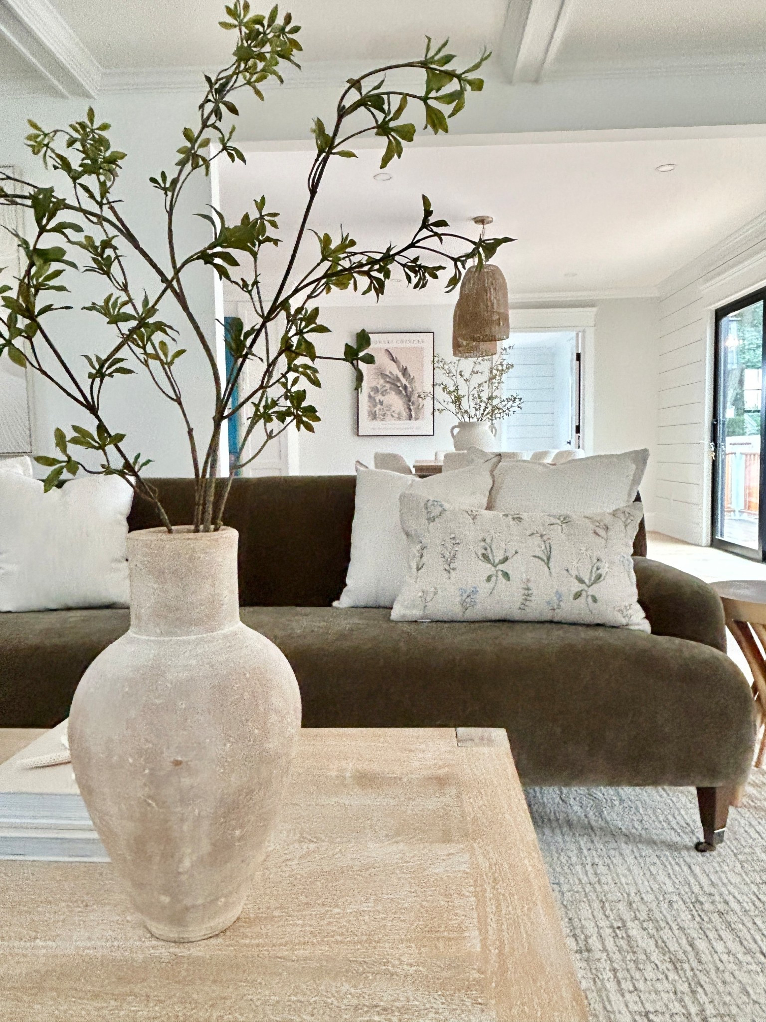 Earthy organic living room.  Green sofa.

#livingroomstyle

#LTKHome