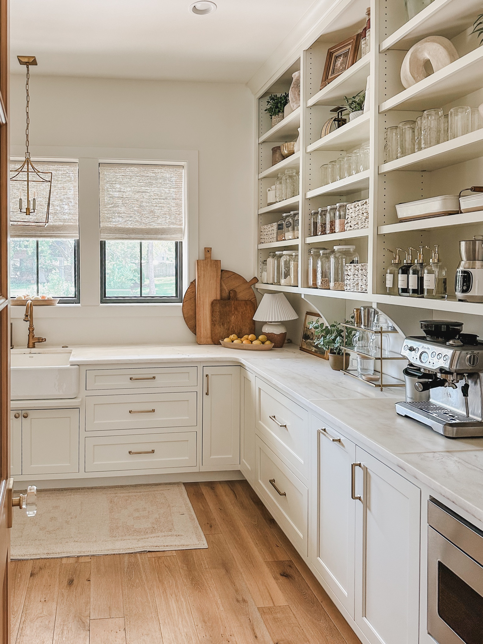 Light and bright prep kitchen featuring open shelving, neutral rug runner, and functional pantry organization 

Home finds, prep kitchen, neutral home, aesthetic finds, light and bright, open shelving, espresso machine, prep sink, gold detail, lighting detail, neutral area rug, found it on Amazon, coffee bar, pantry organization, organized home, shop the look!

#LTKHome #LTKStyleTip #LTKSeasonal