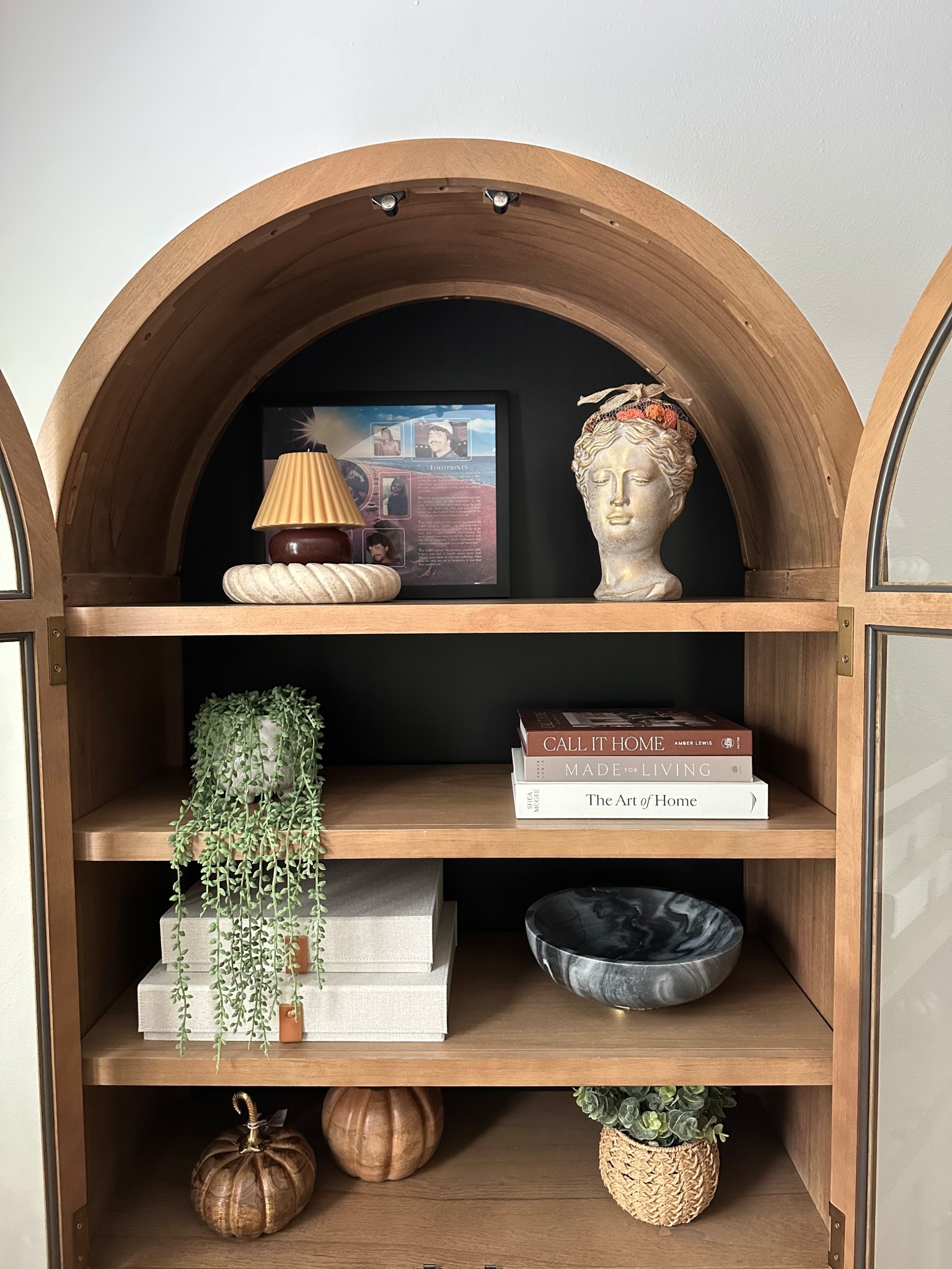 Sam’s Club viral Member's Mark Enzo Storage Cabinet With Rattan Cabinet Doors. Such good quality and finally almost finished styling it!! 

Target lampshade candle & Target marble dish

Made for Living: Collected Interiors for All Sorts of Styles book 

The Art of Home: A Designer Guide to Creating an Elevated Yet Approachable Home book 

Decorative Photo Storage Boxes with Lids - Set of 2 Linen Organizers

The marble bowl and plants are TJ Maxx 

Arch cabinet, wood cabinet, shelf styling, shelf decor, marble dish, stone bowl


#LTKStyleTip #LTKSeasonal #LTKHome