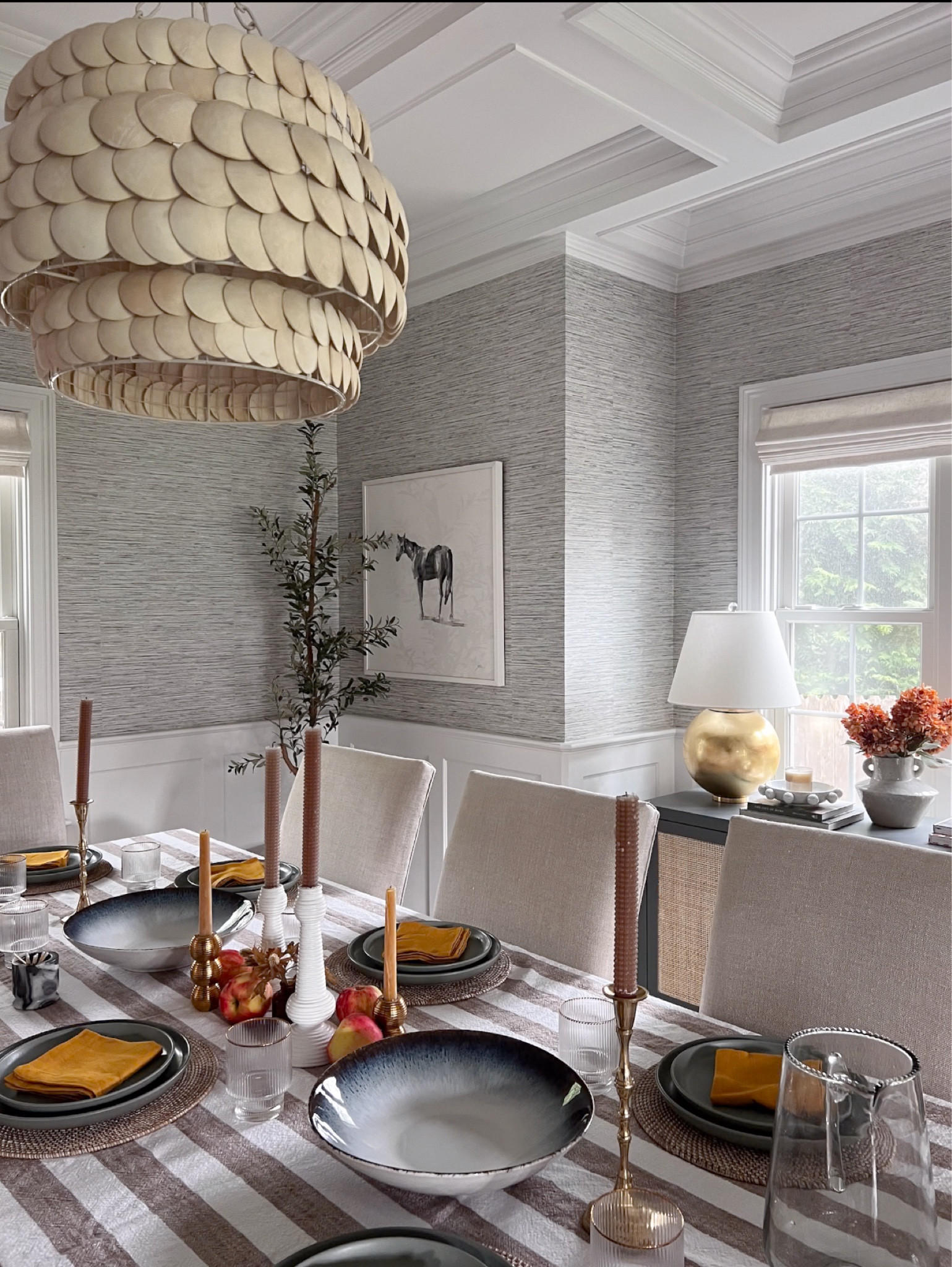 Thanksgoving table inspo! I love to mix a few colors and patterns in my tablscape and then layer in fun serving pieces, greenery and even fruit. 

All of my table linens along with this wallpaper, chandelier and brass table lamp are on sale! The linen napkins are my absolute favorite: I own them in so many colors and always pick up a new set during sales. They wash and dry perfectly!! 

#LTKHome #LTKSaleAlert #LTKSeasonal