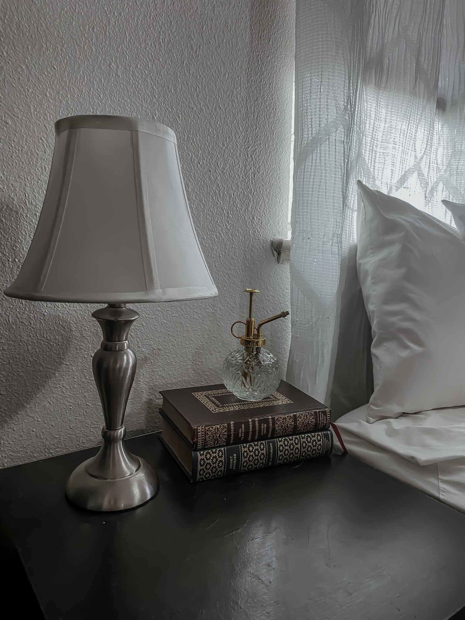 Nightstand simple decor - room spray with books and lamp

#LTKFind #LTKunder50 #LTKhome
