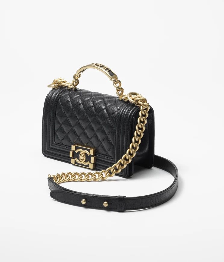 BOY CHANEL Flap Bag with Handle

            
		Grained Shiny Calfskin & Gold-Tone Metal
	
		Blac... | Chanel, Inc. (US)