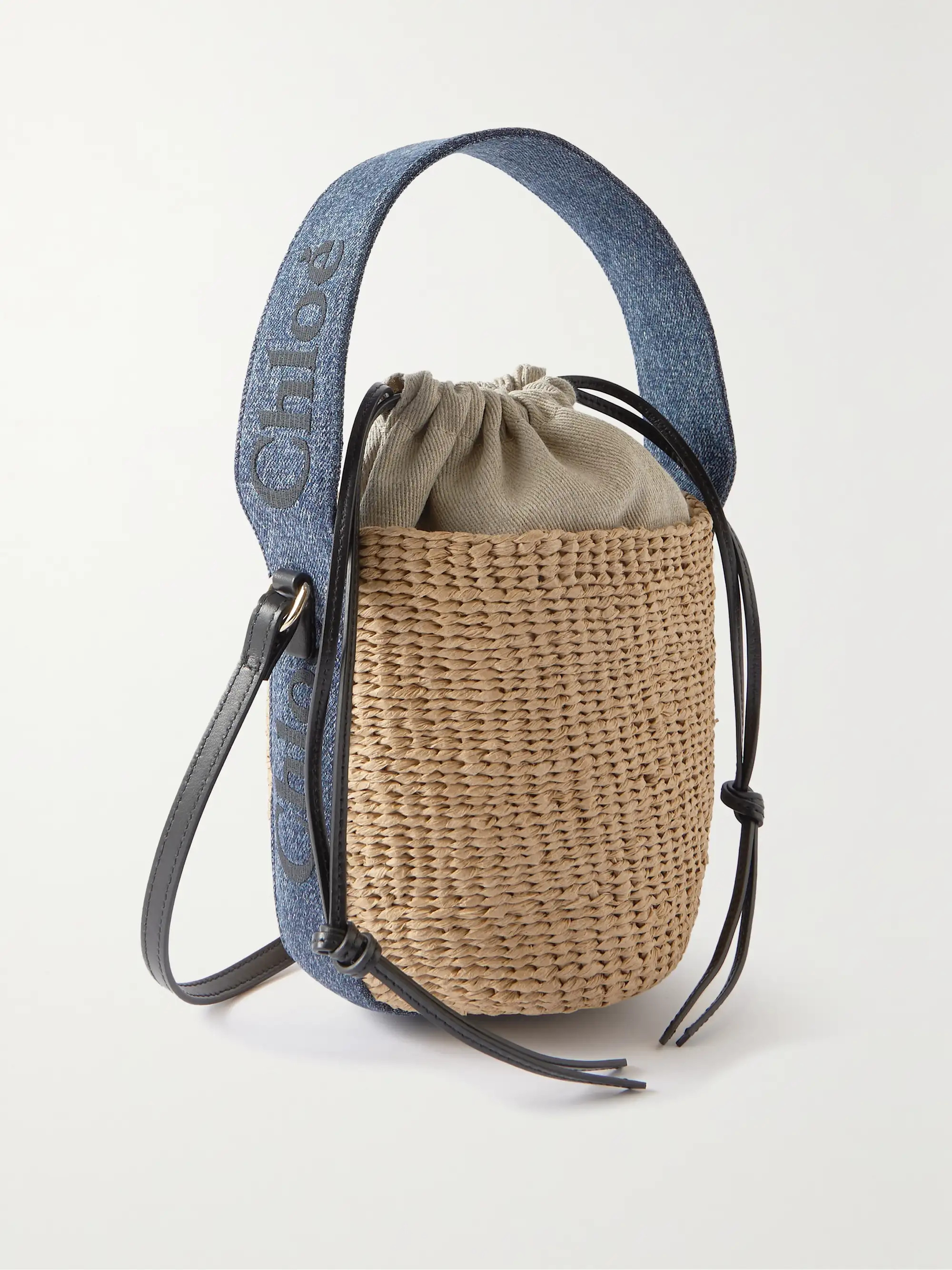 + NET SUSTAIN Woody small denim-trimmed raffia basket bag | NET-A-PORTER (UK & EU)
