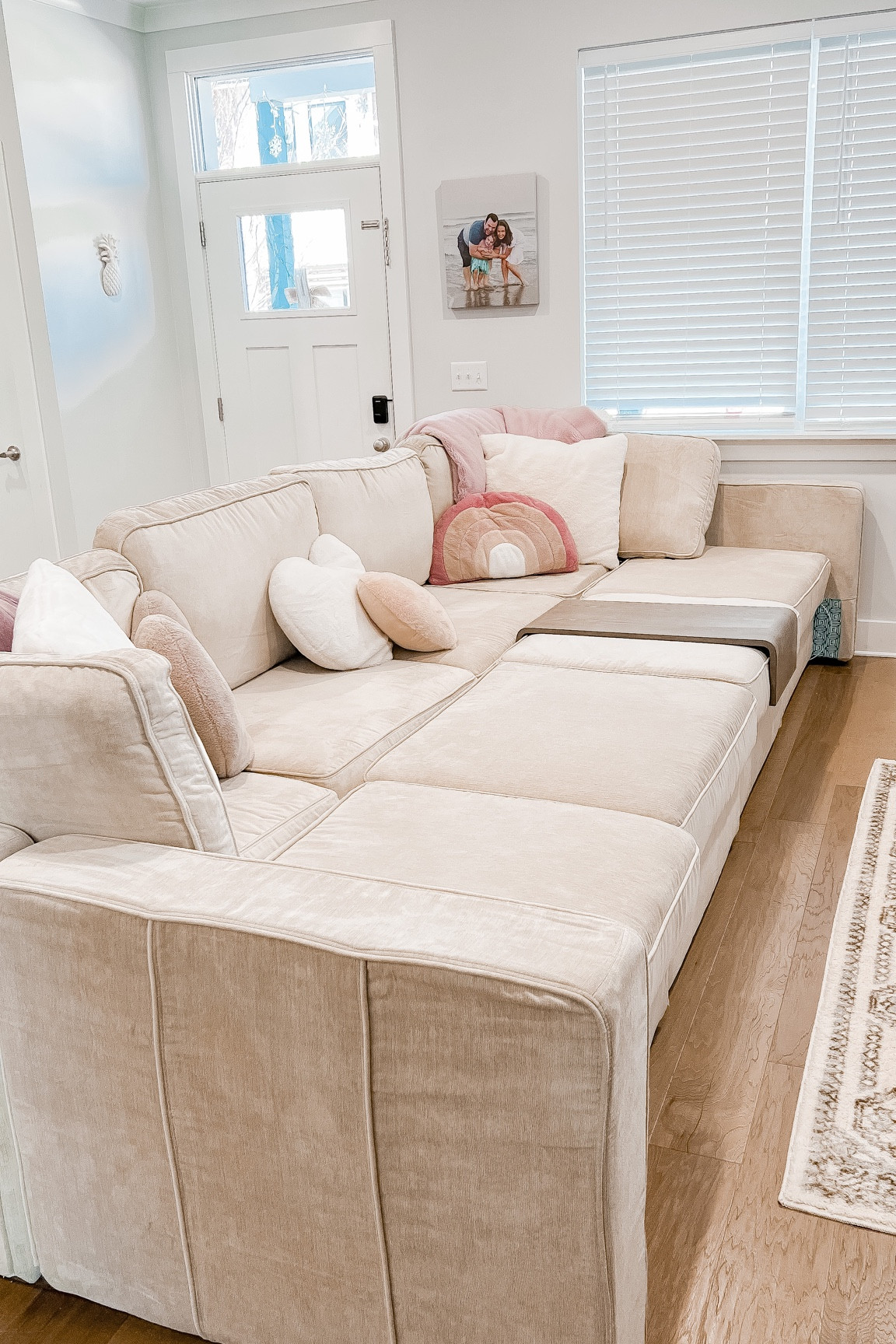 This is our LoveSac couch and it’s the BEST! We have 4 regular seats, 4 storage seats and 8 sides. This is the tan combed chenille fabric. The individual pieces and the accessories we have are linked here 

#LTKhome #LTKfamily