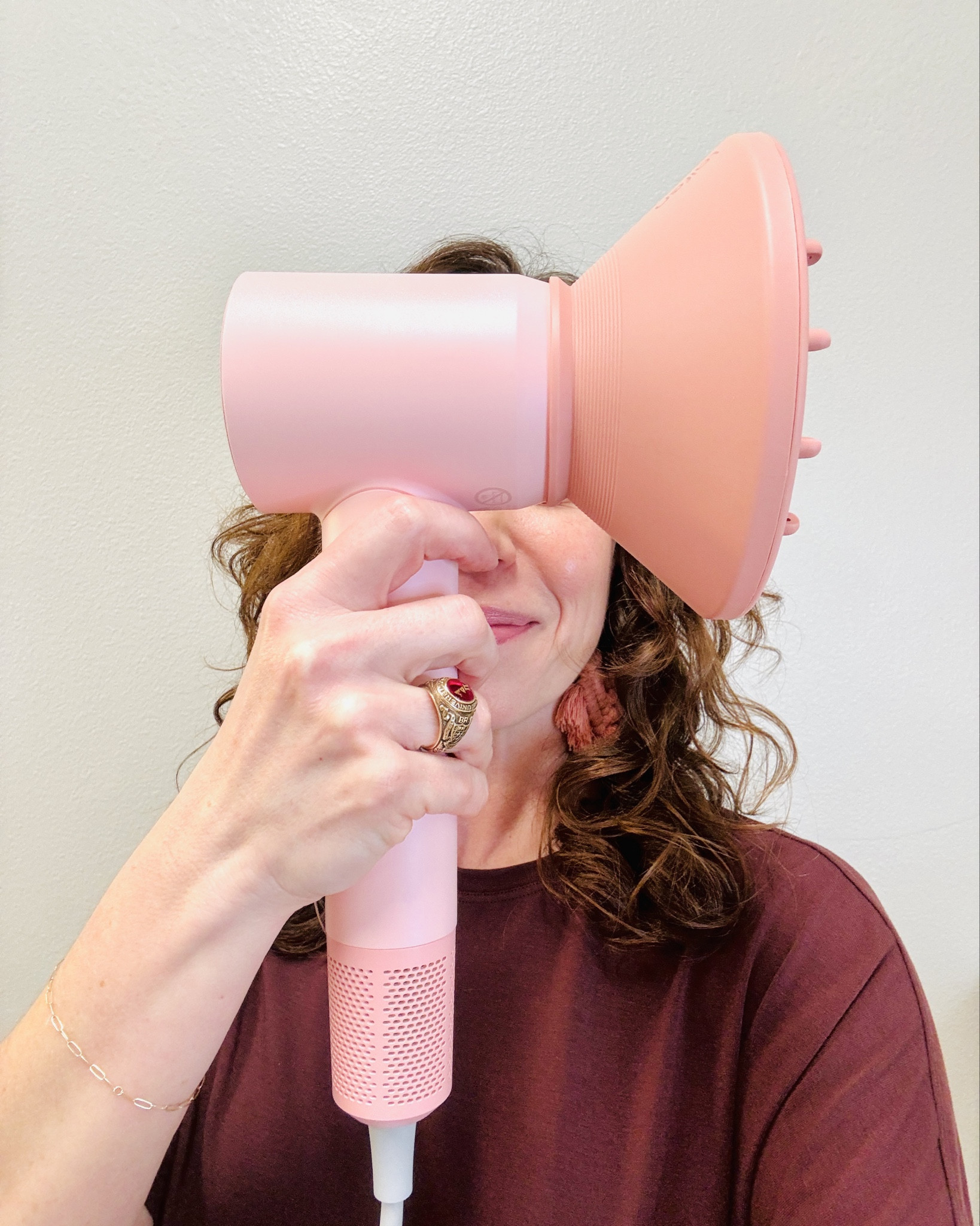 When my silver/gray Dyson professional dryer died recently, I was ready for something a little more...colorful! Laifen (THE Dyson dupe) to the rescue with this pink hairdryer. Also eye-catching: The lavender, pearl white, pearl pink, and navy-and-gold! The things we hair people obsess over... 