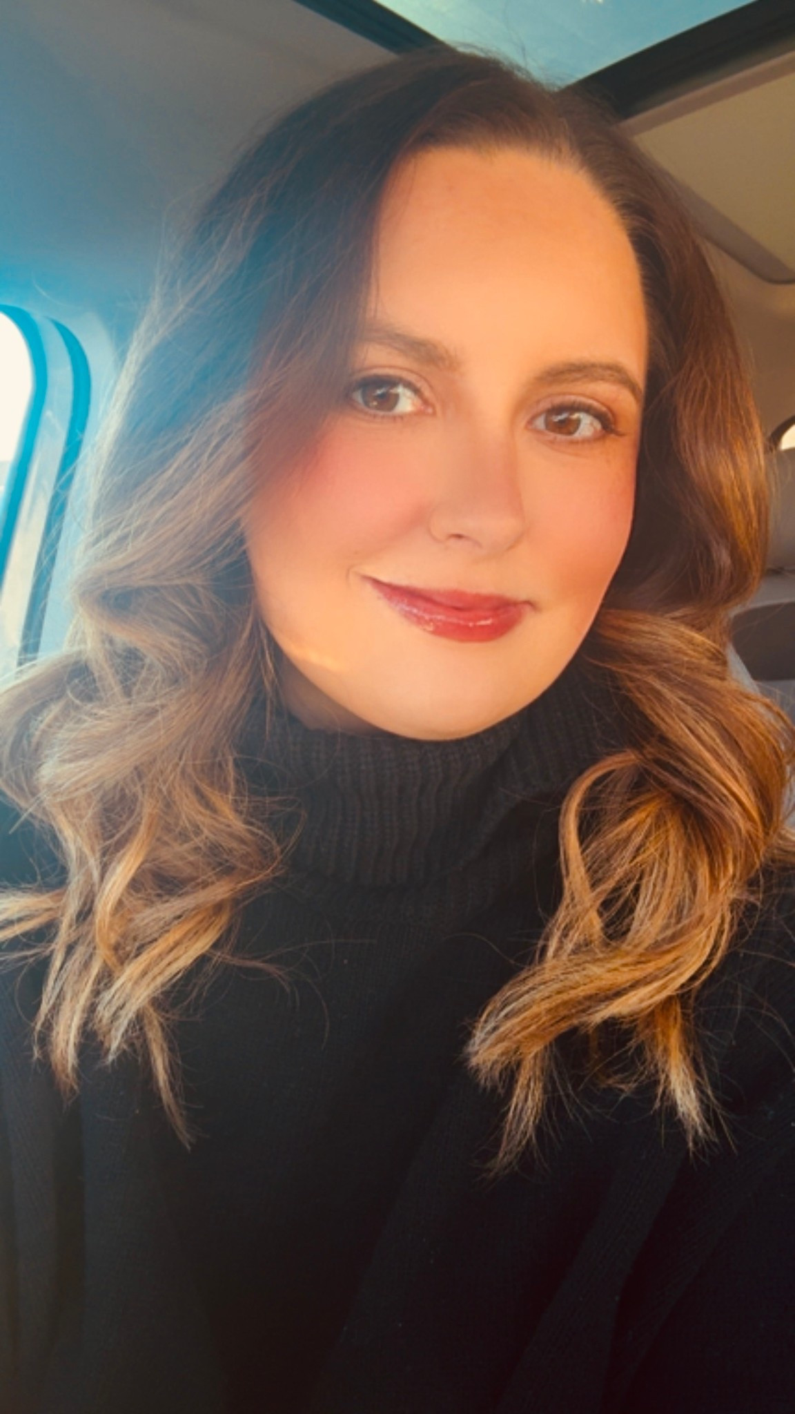 December outfit of the day 🖤🎄 // LOFT black turtleneck sweater, ILIA skin tint foundation, Buxom lip gloss in the shade Gabby, Merit cream bronzer and blush, Rare Beauty highlighter 

#LTKHoliday #LTKootd #LTKBeauty
