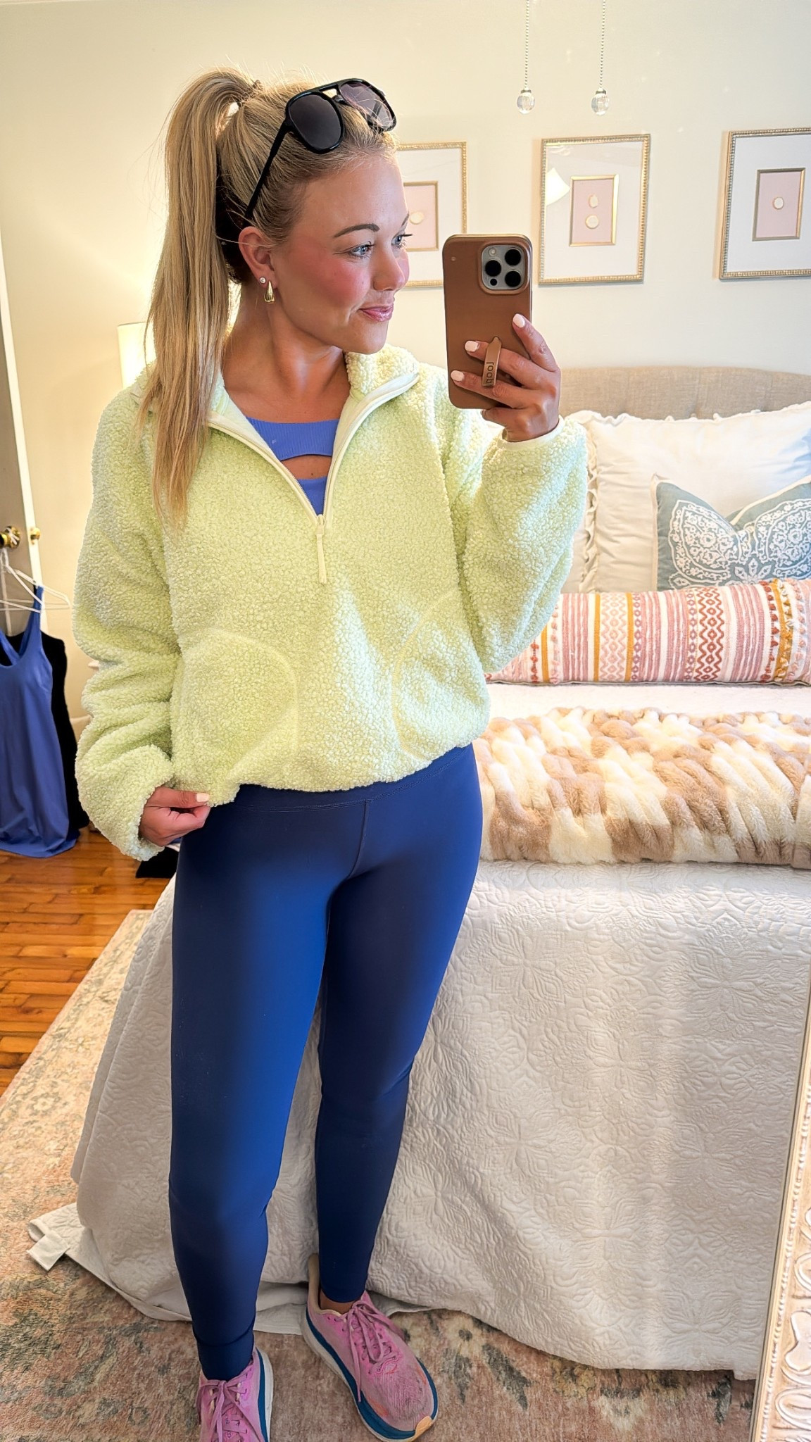 Very few sizes left in the pullover!

I’m wearing a small in the pullover and medium in the tank and leggings 💙💚