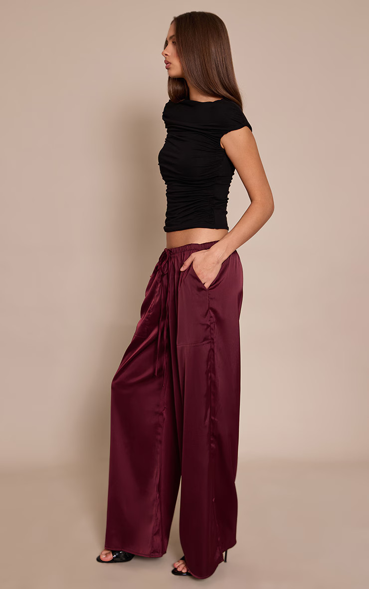 Burgundy Satin Low Rise Wide Leg Drawstring Trousers | PrettyLittleThing UK